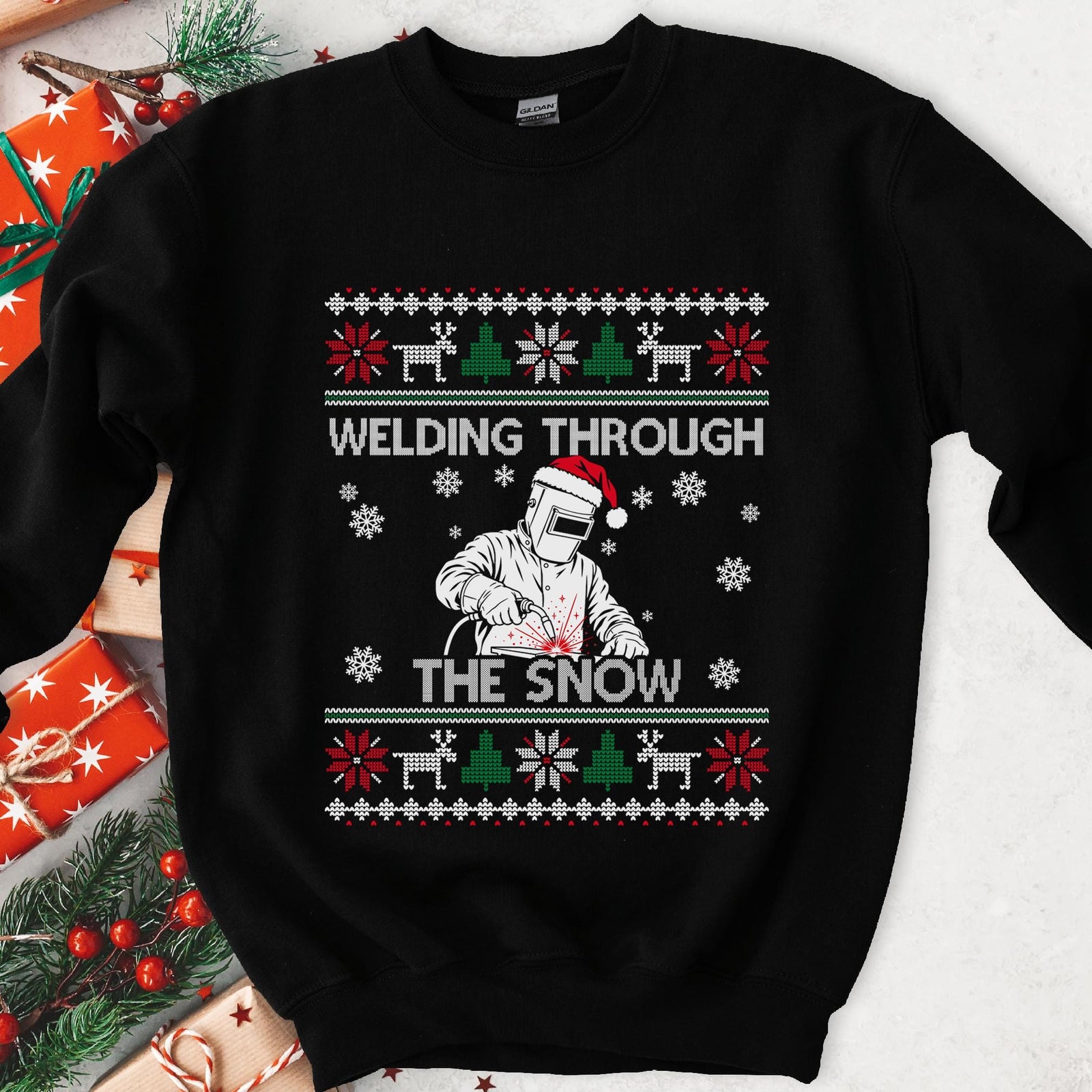 Welding Through the Snow Welder Christmas Sweatshirt - black crewneck, welder in a hood and Santa hat with sparks