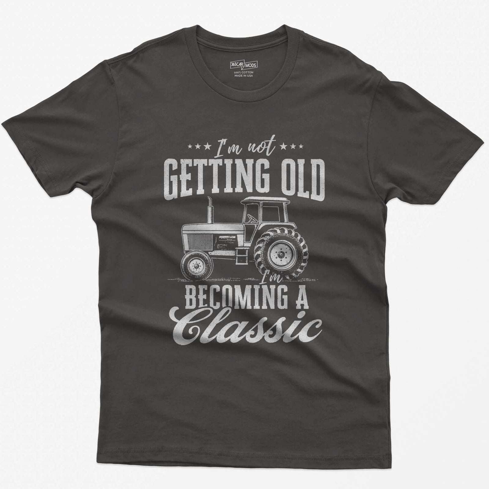 Dark Heather t-shirt with I'm Not Getting Old I'm Becoming a Classic in distressed white print around a vintage cab tractor