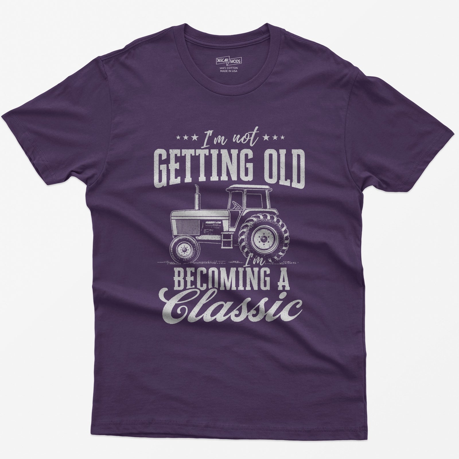 Purple t-shirt with I'm Not Getting Old I'm Becoming a Classic in distressed white print around a vintage cab tractor