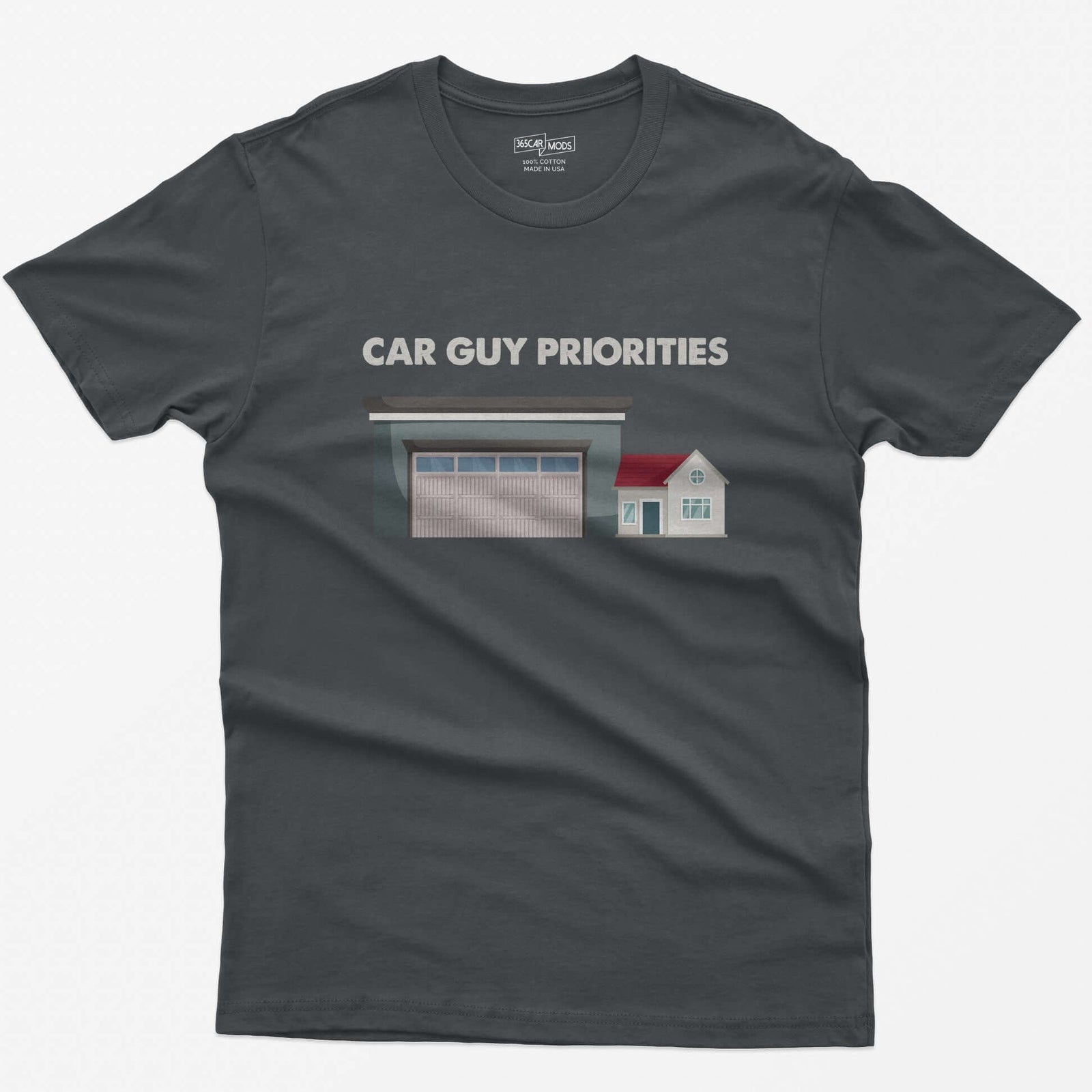 Charcoal t-shirt with Car Guy Priorities text above a huge garage next to a tiny house illustration