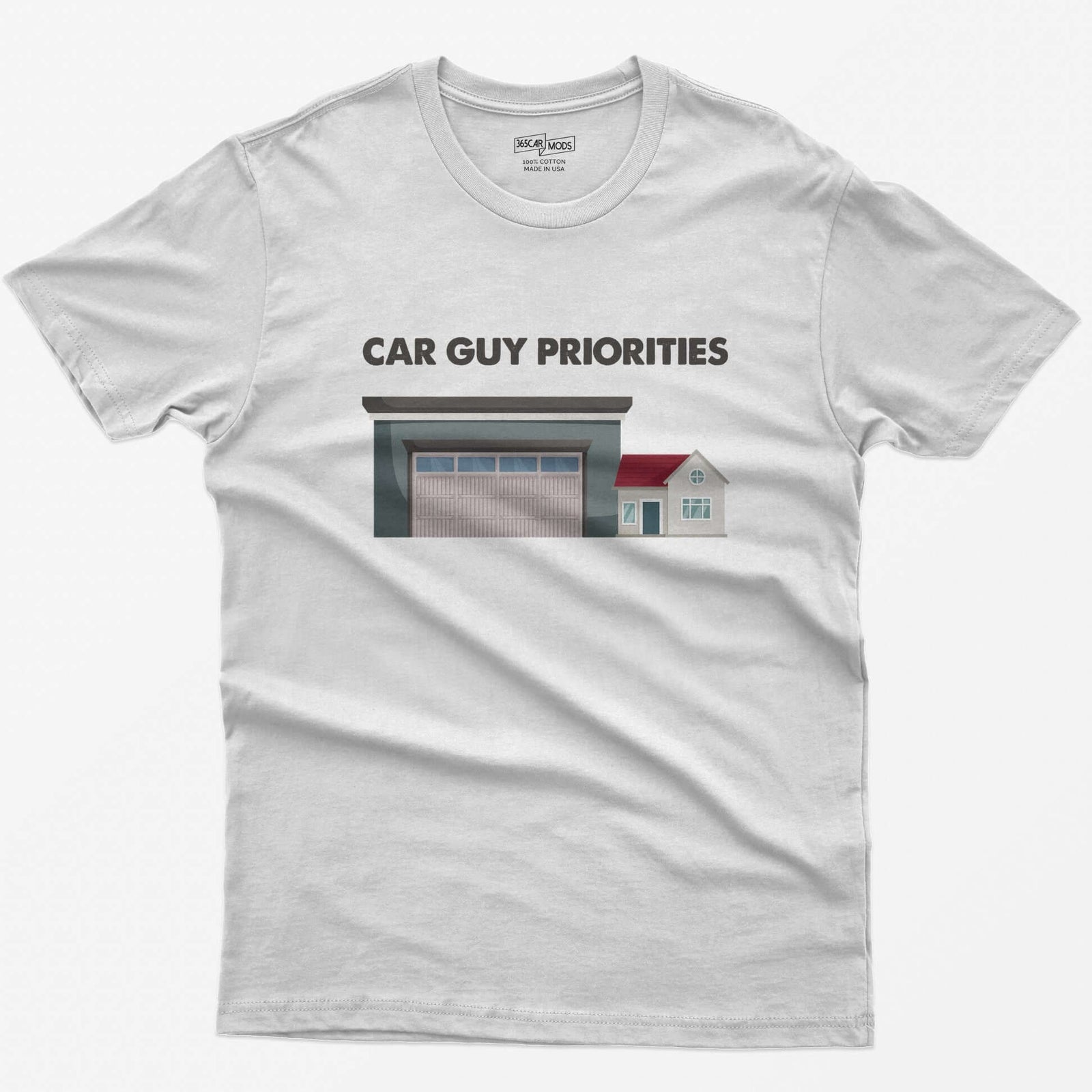 White t-shirt with Car Guy Priorities text above a huge garage next to a tiny house illustration