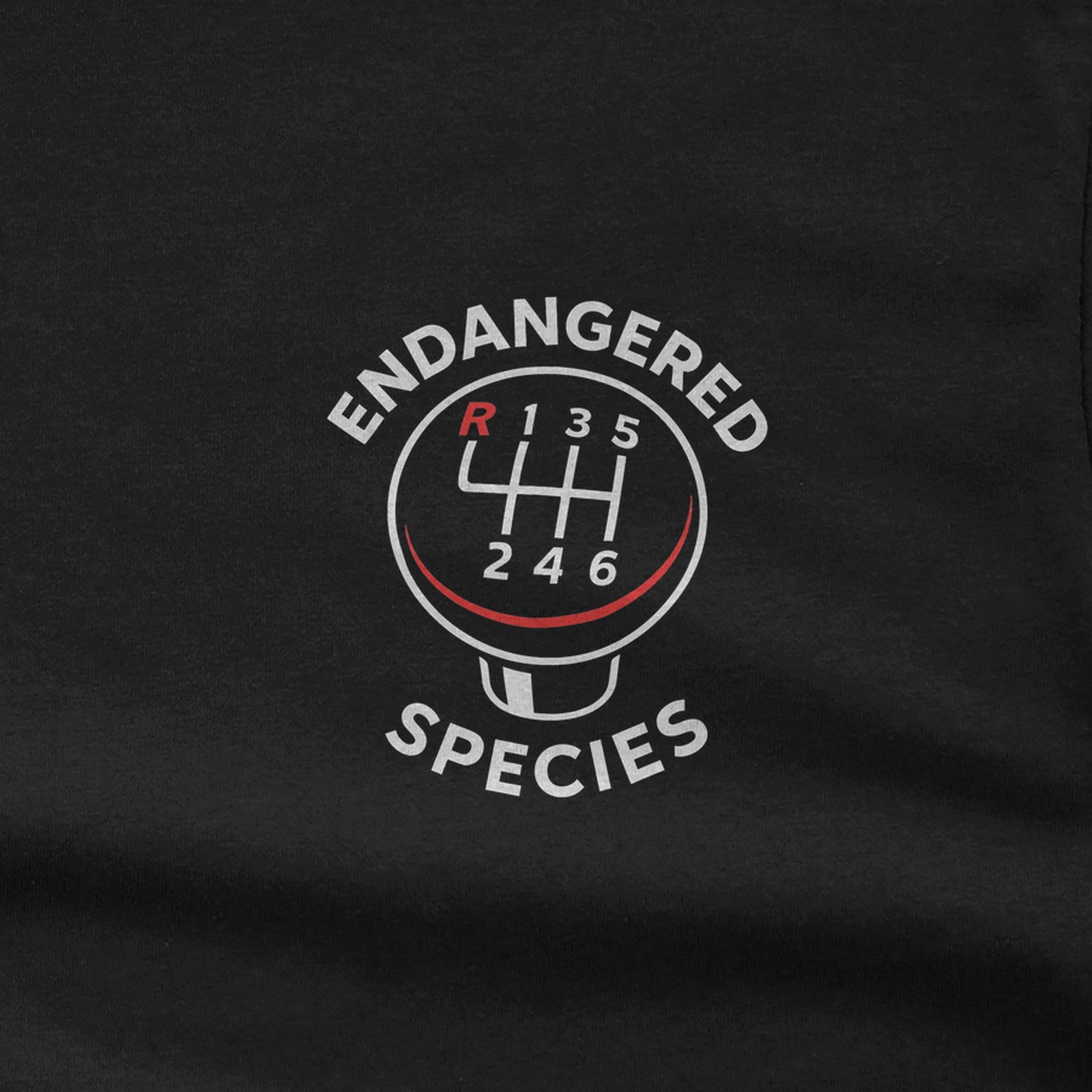Endangered Species Stick Shift T-Shirt design close-up