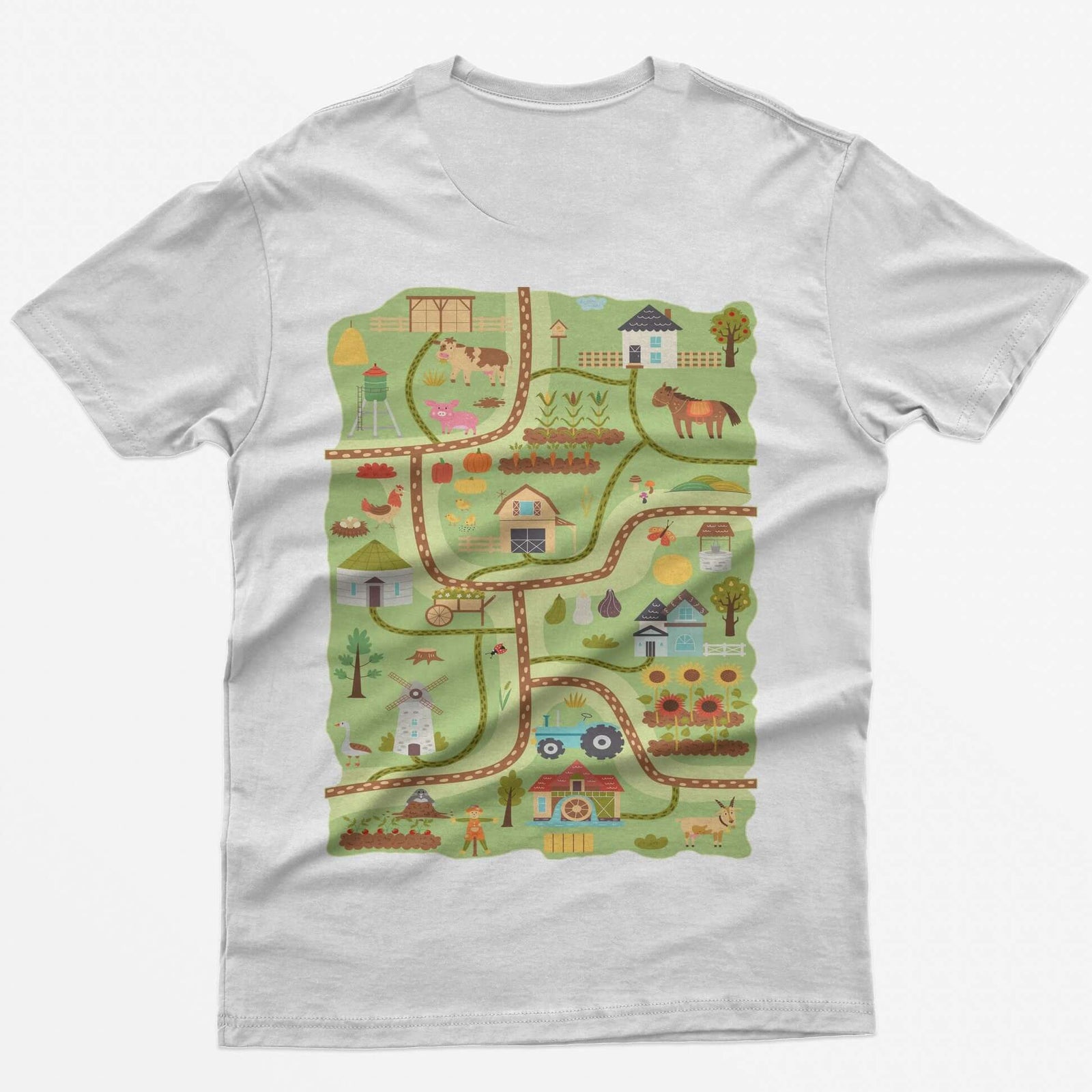White t-shirt with a farm road play mat on the back: barn, tractor, windmill, sunflowers and animals on winding roads