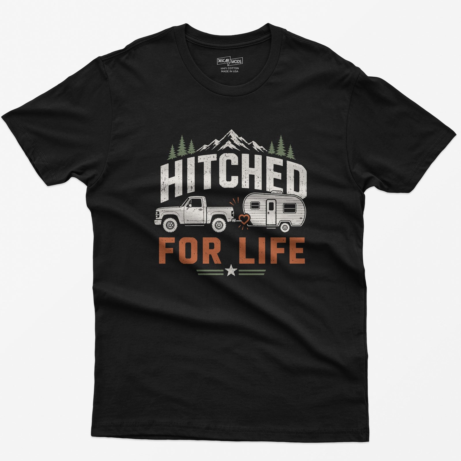 Black t-shirt with Hitched For Life, a pickup towing a travel trailer joined by a heart-shaped hitch, mountains and pines