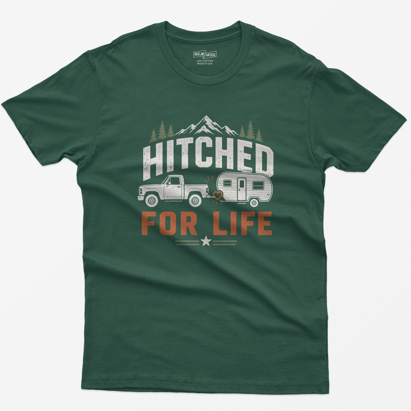 Forest Green t-shirt with Hitched For Life, a pickup towing a travel trailer joined by a heart-shaped hitch, mountains and pines