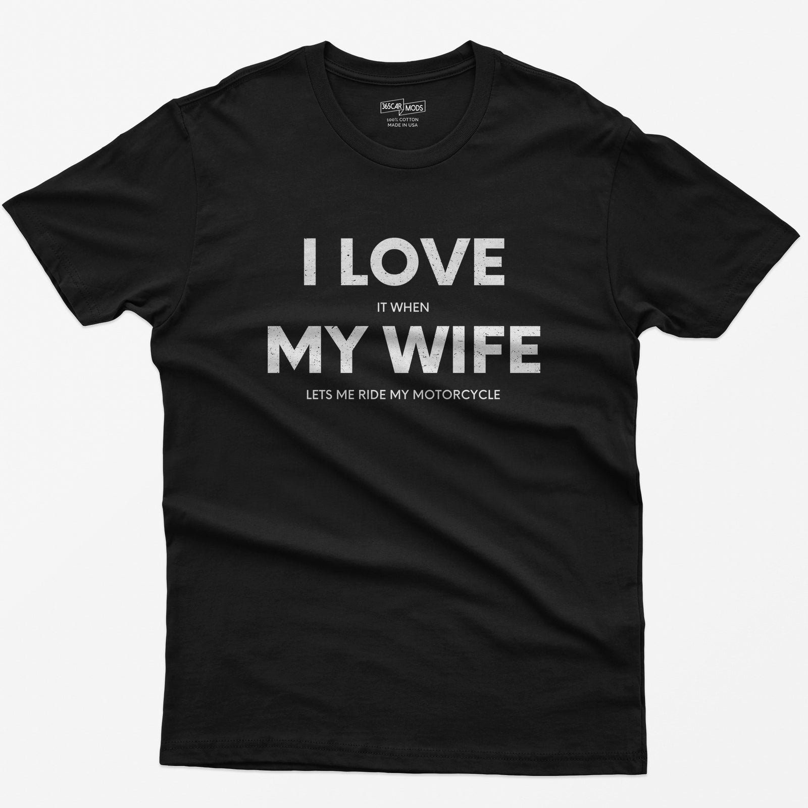 Black t-shirt with I Love My Wife in big white letters and small print reading it when and lets me ride my motorcycle