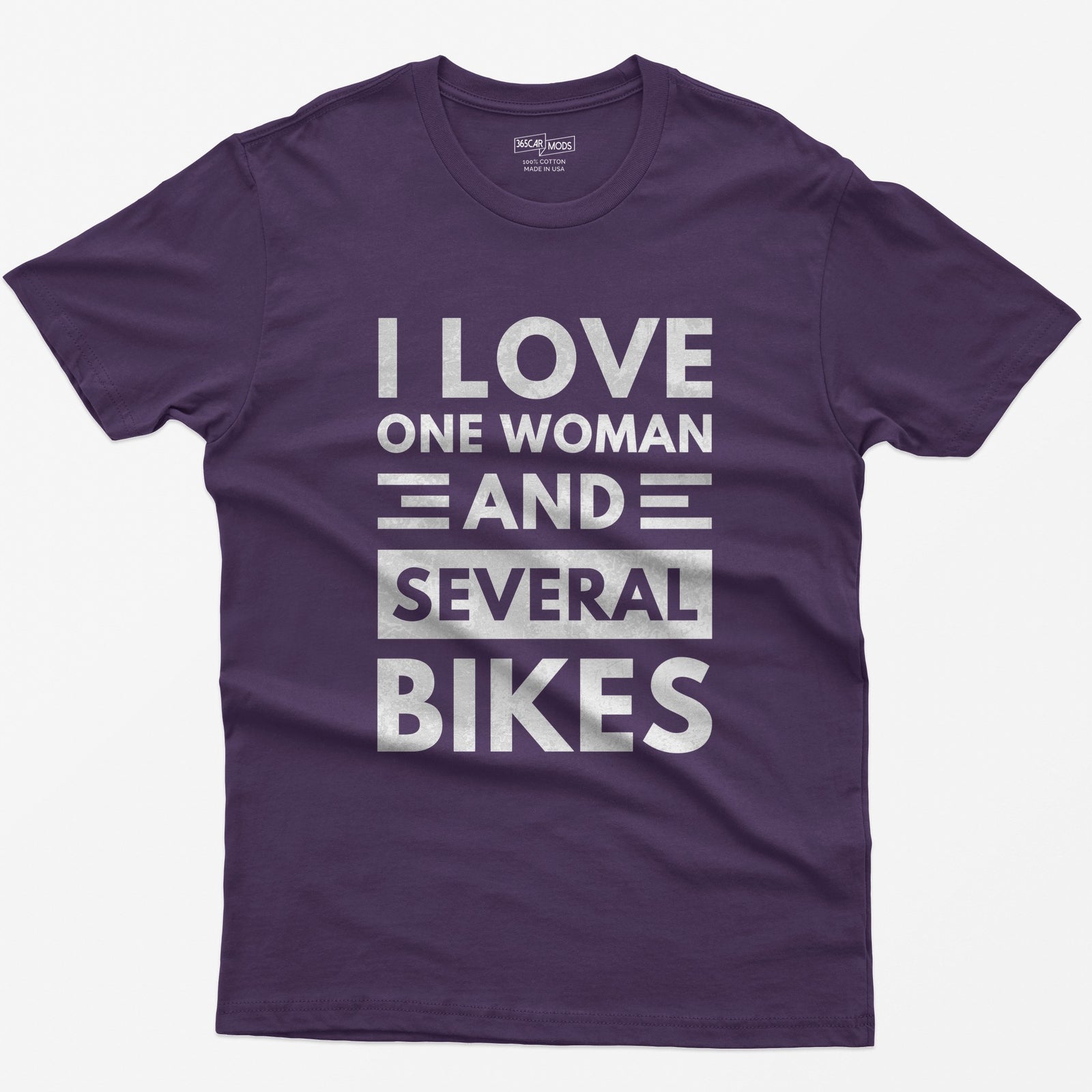 Purple t-shirt with distressed white block text reading I Love One Woman and Several Bikes