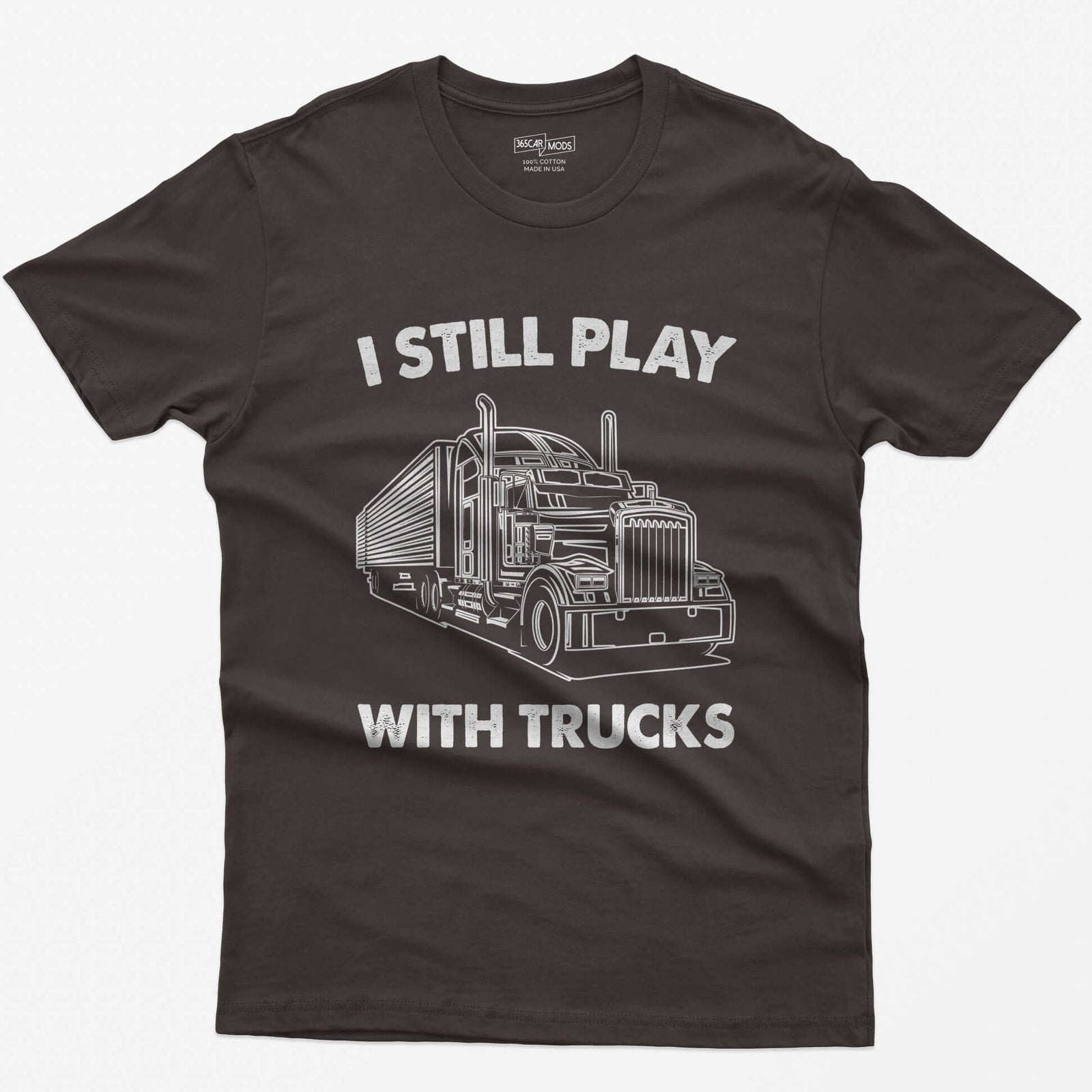 Dark Chocolate t-shirt with I Still Play With Trucks text and a white line drawing of a long-nose semi truck with trailer