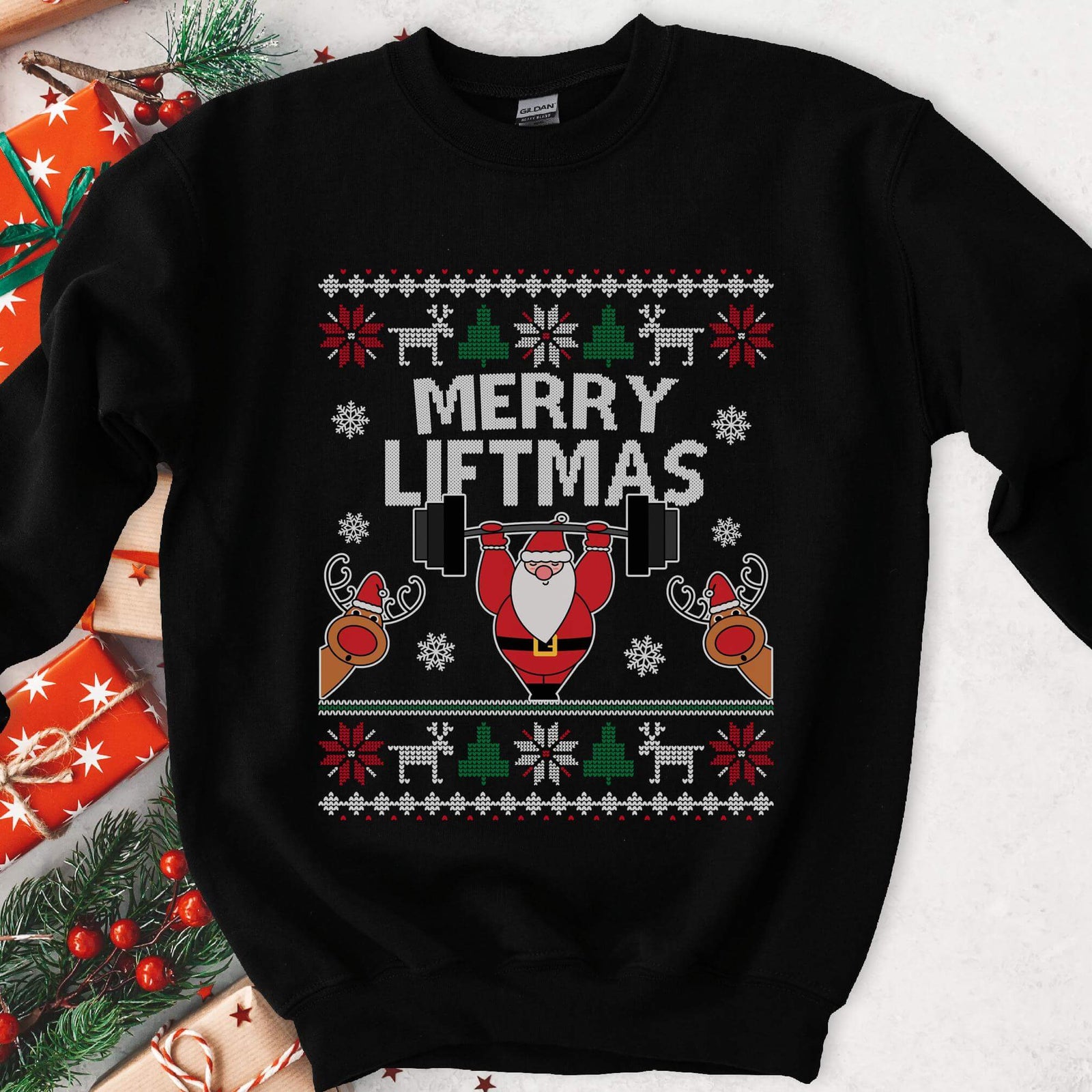 Dark sweatshirt with knit borders, Santa pressing a barbell overhead and two peeking reindeer, text Merry Liftmas