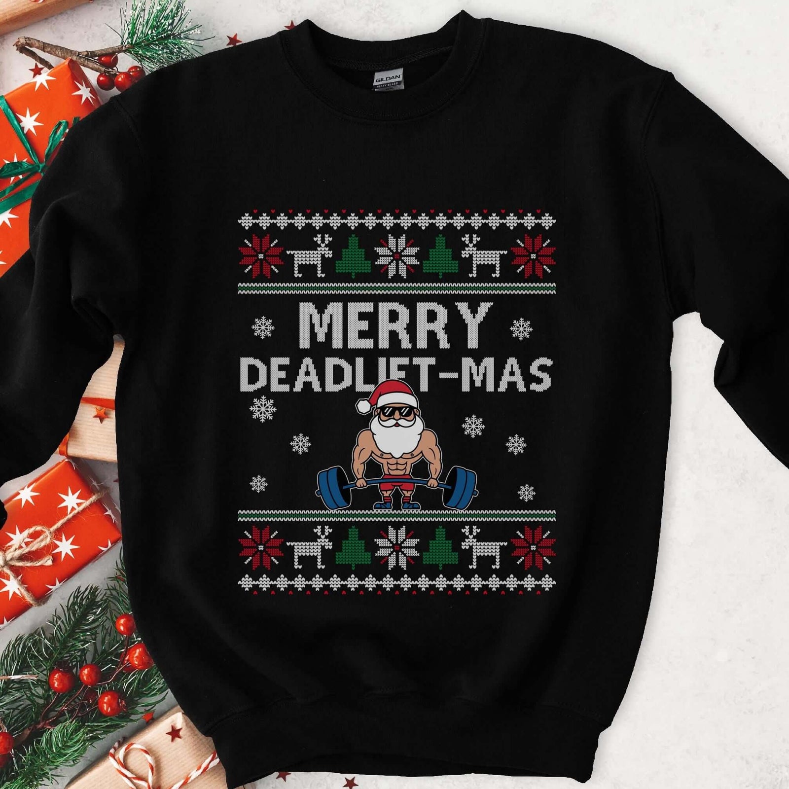 Dark sweatshirt with ugly sweater knit borders and a muscular Santa in sunglasses deadlifting, text Merry Deadlift-Mas