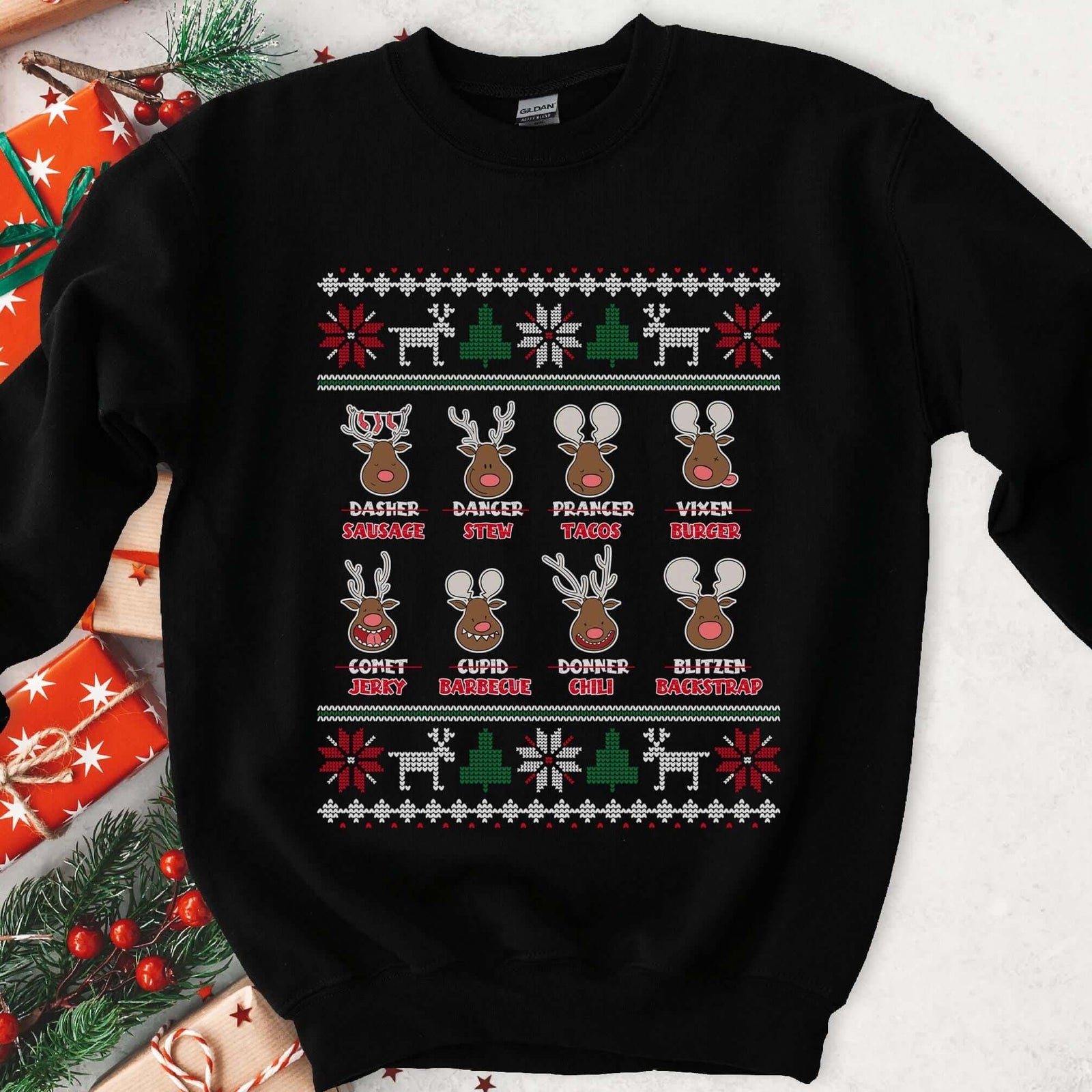Dark sweatshirt with knit borders and eight reindeer whose names are crossed out for foods like Jerky and Chili