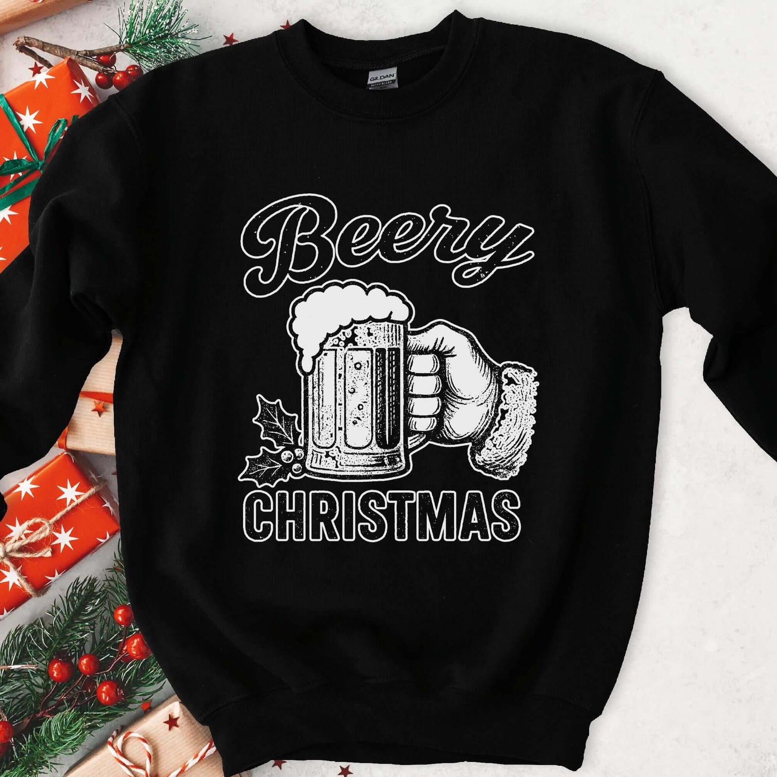 Dark sweatshirt with vintage white art of Santa's hand holding a foamy beer mug and holly, text Beery Christmas