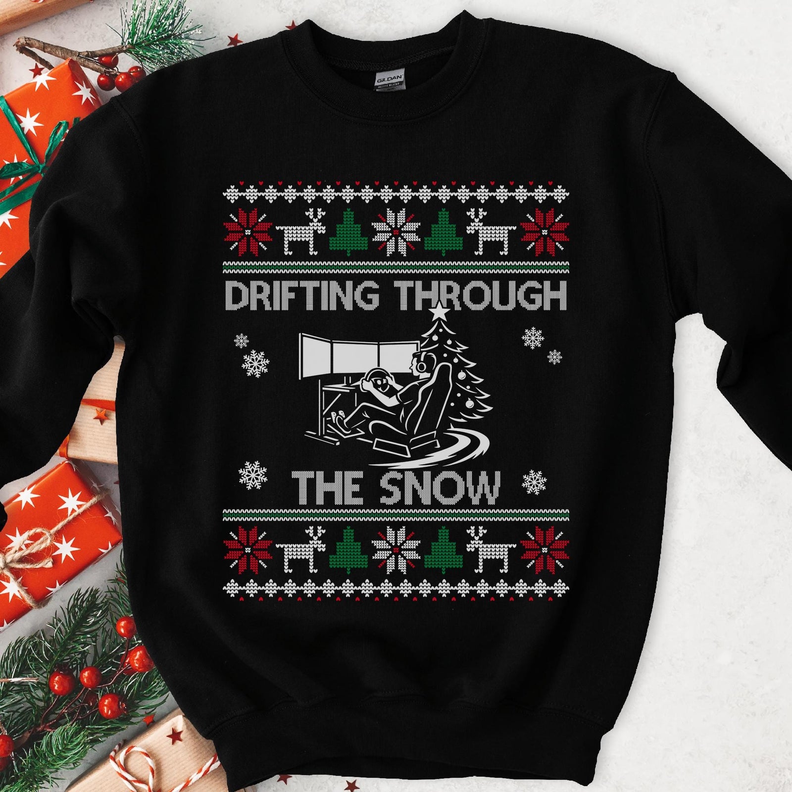 Dark Christmas sweatshirt with a sim racer at a triple-screen rig, DRIFTING THROUGH THE SNOW, knit borders