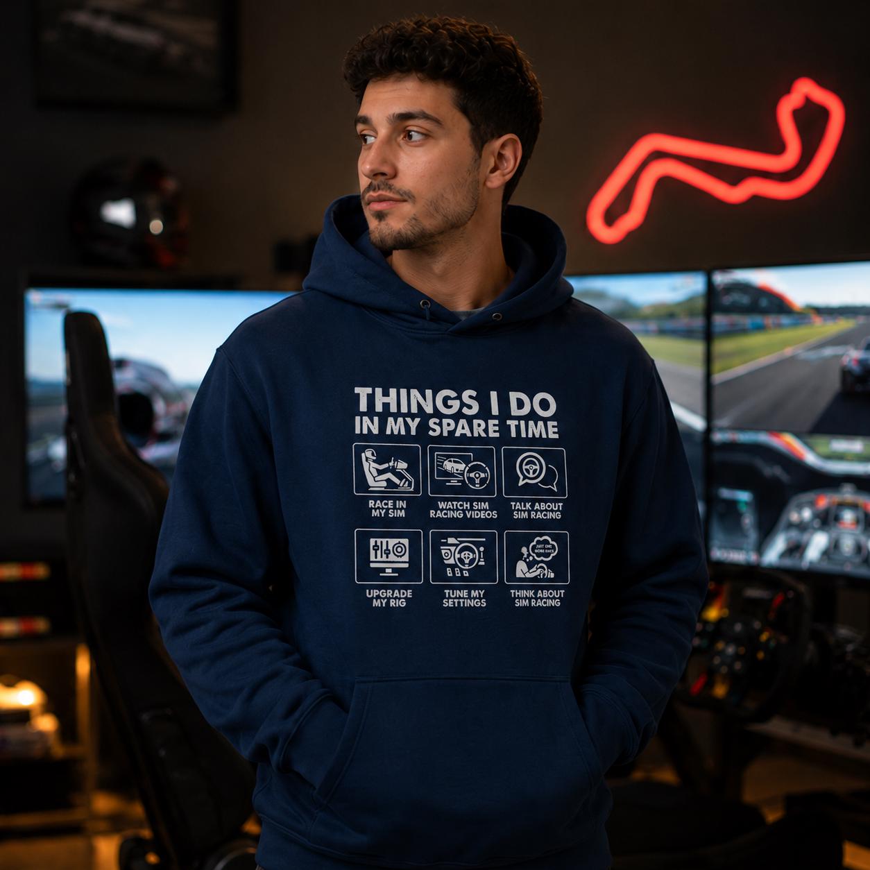 Sim Racing Hoodie - man wearing the navy hoodie in a sim racing room