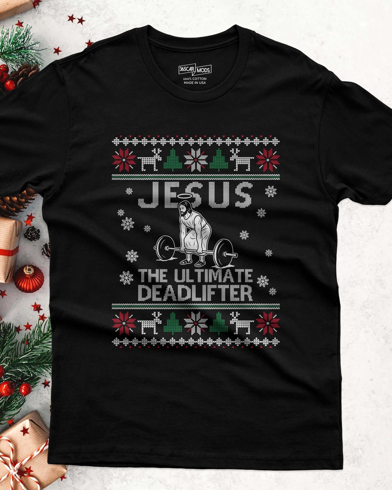 A black short-sleeved t-shirt featuring a graphic print with the text 'JESUS THE ULTIMATE DEADLIFTER'.