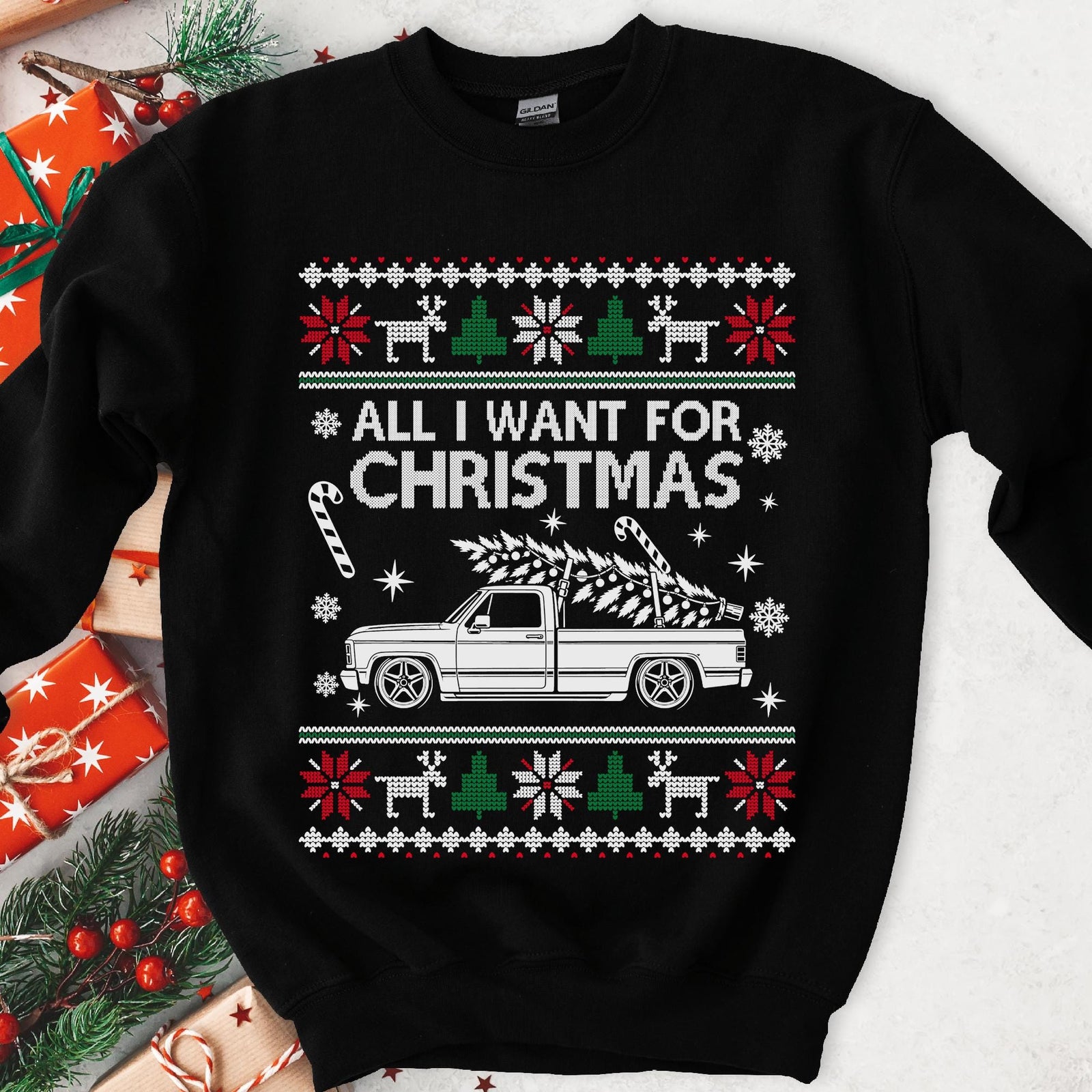 Christmas sweatshirt with ALL I WANT FOR CHRISTMAS and a custom-drawn pickup truck hauling a tree, knit borders