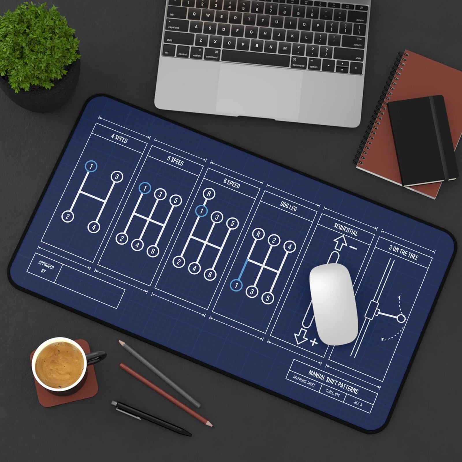 Manual shift patterns desk mat, angled top view with mouse