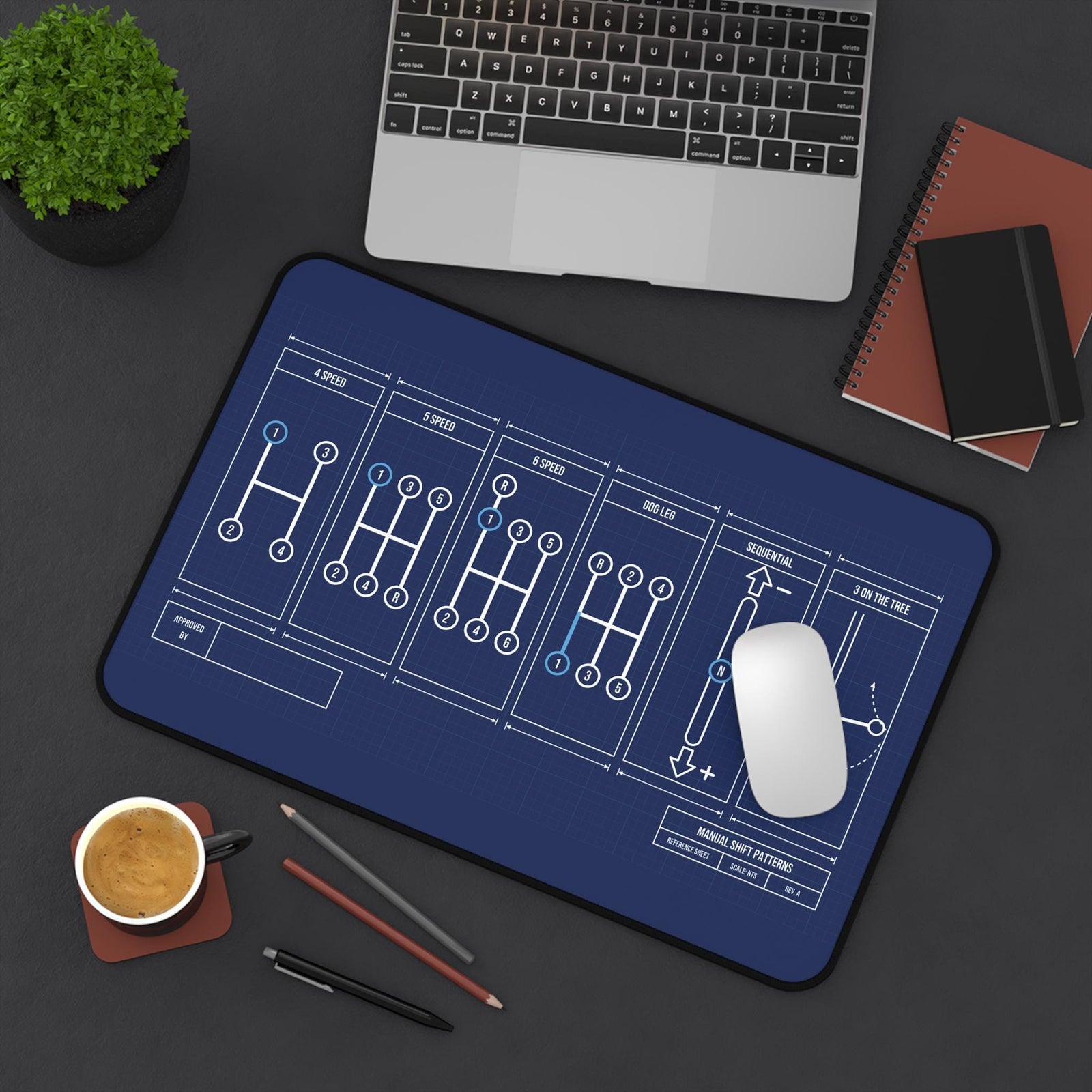 Manual shift patterns desk mat, small size, top view with mouse and coffee