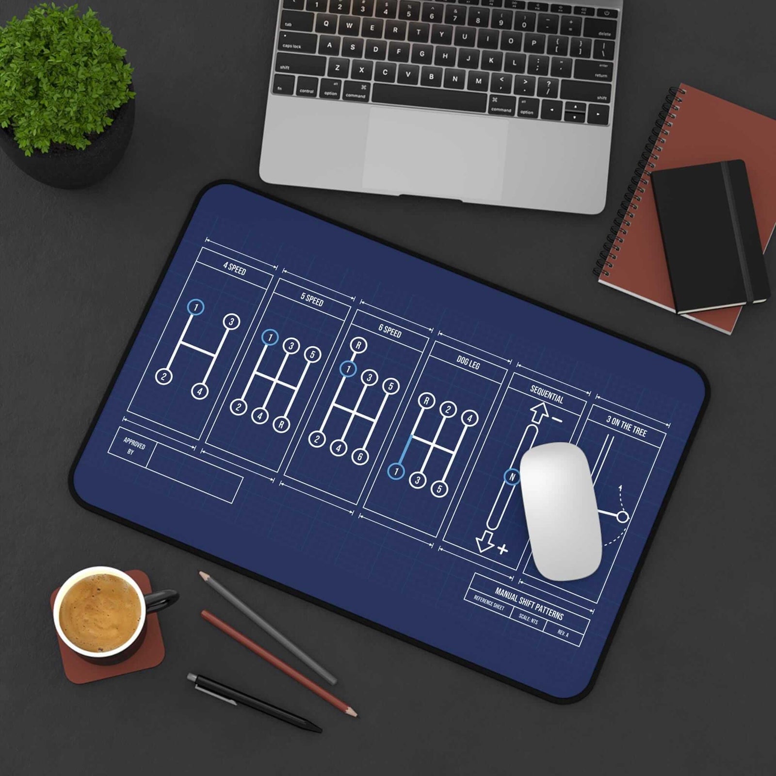 Manual shift patterns desk mat, small size, top view with mouse and coffee