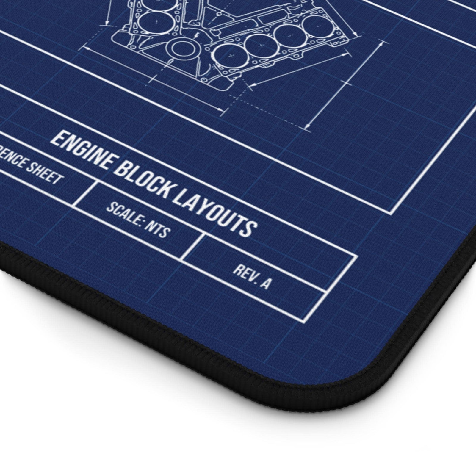 Close-up of the Engine Block Layouts title block on the blueprint desk mat
