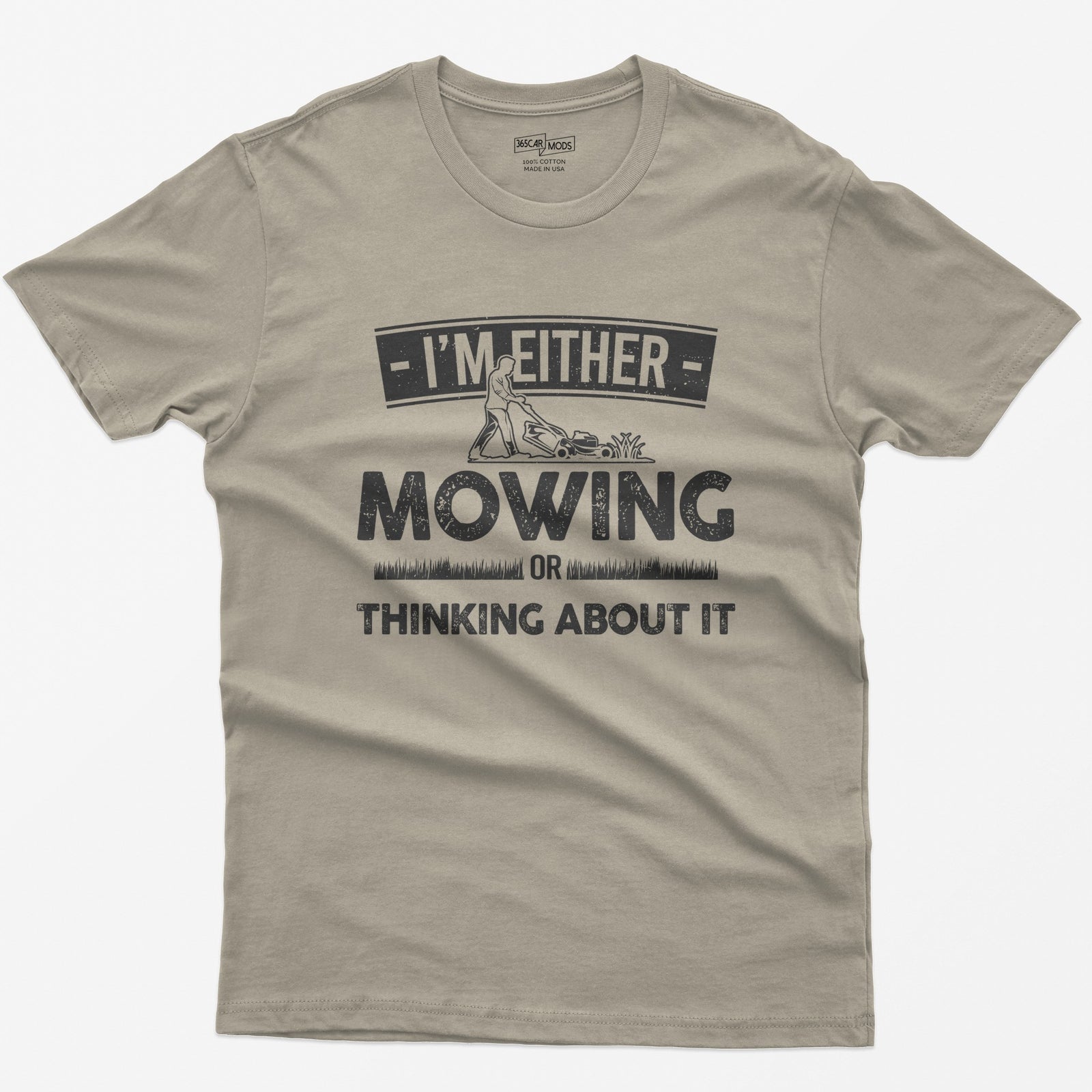 Sand t-shirt with I'm Either Mowing or Thinking About It text and a man pushing a lawn mower through grass