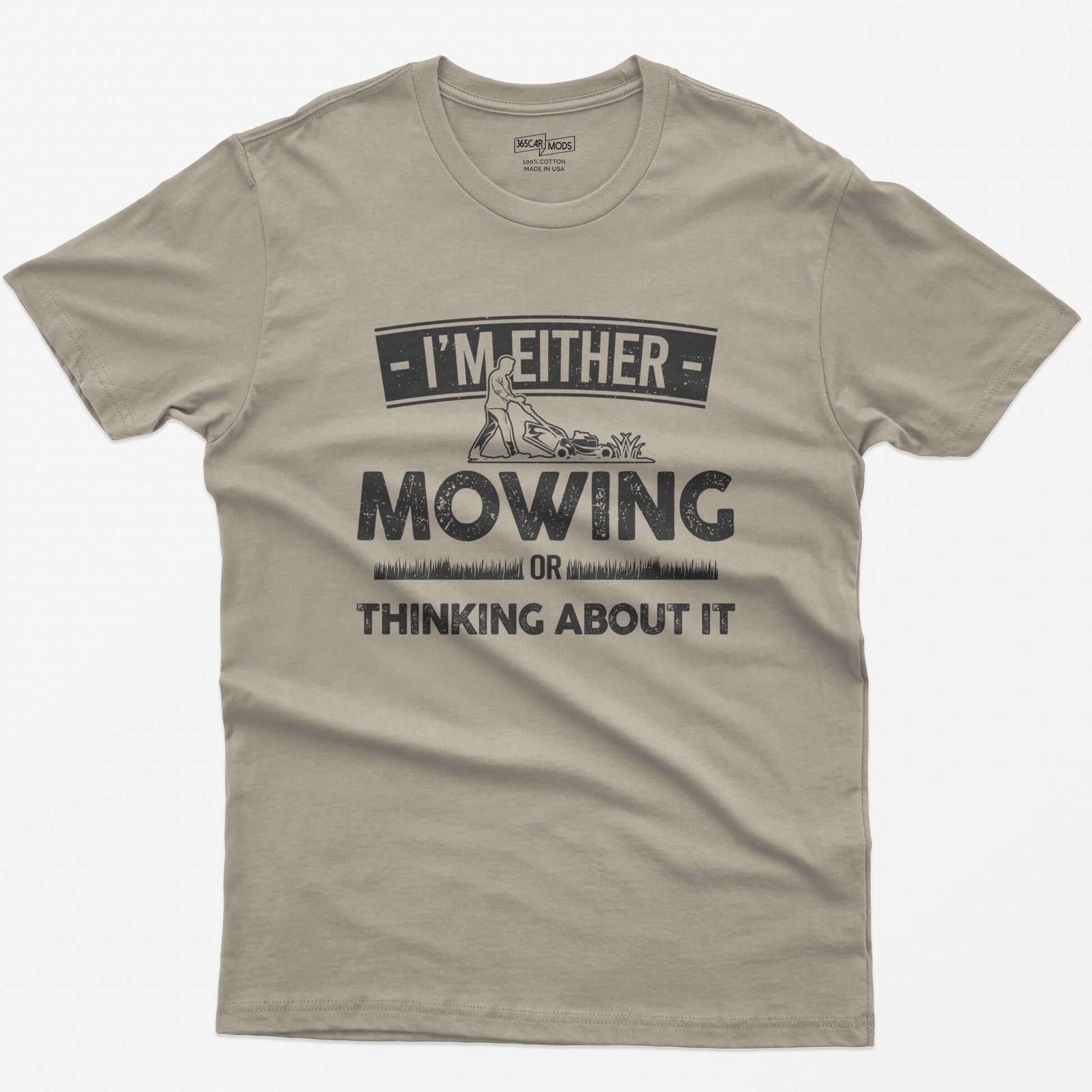 Sand t-shirt with I'm Either Mowing or Thinking About It text and a man pushing a lawn mower through grass
