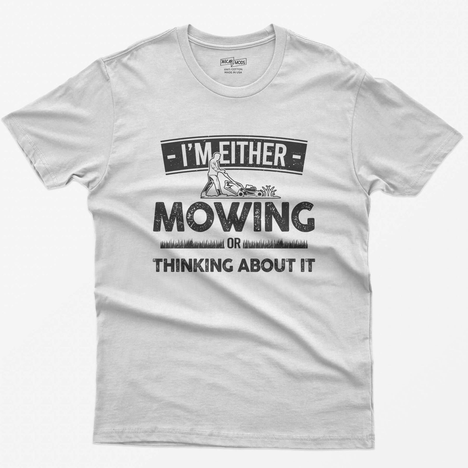 White t-shirt with I'm Either Mowing or Thinking About It text and a man pushing a lawn mower through grass