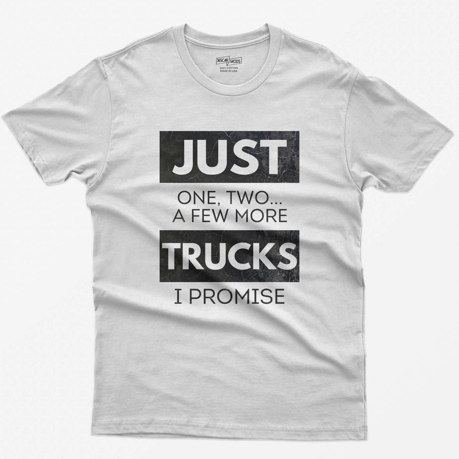 White t-shirt with Just One, Two, a Few More Trucks I Promise in bold stacked type on white blocks