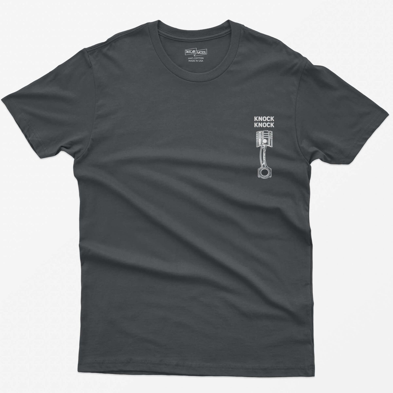 Charcoal t-shirt with Knock Knock text above a white line-art piston and connecting rod with a damaged crown