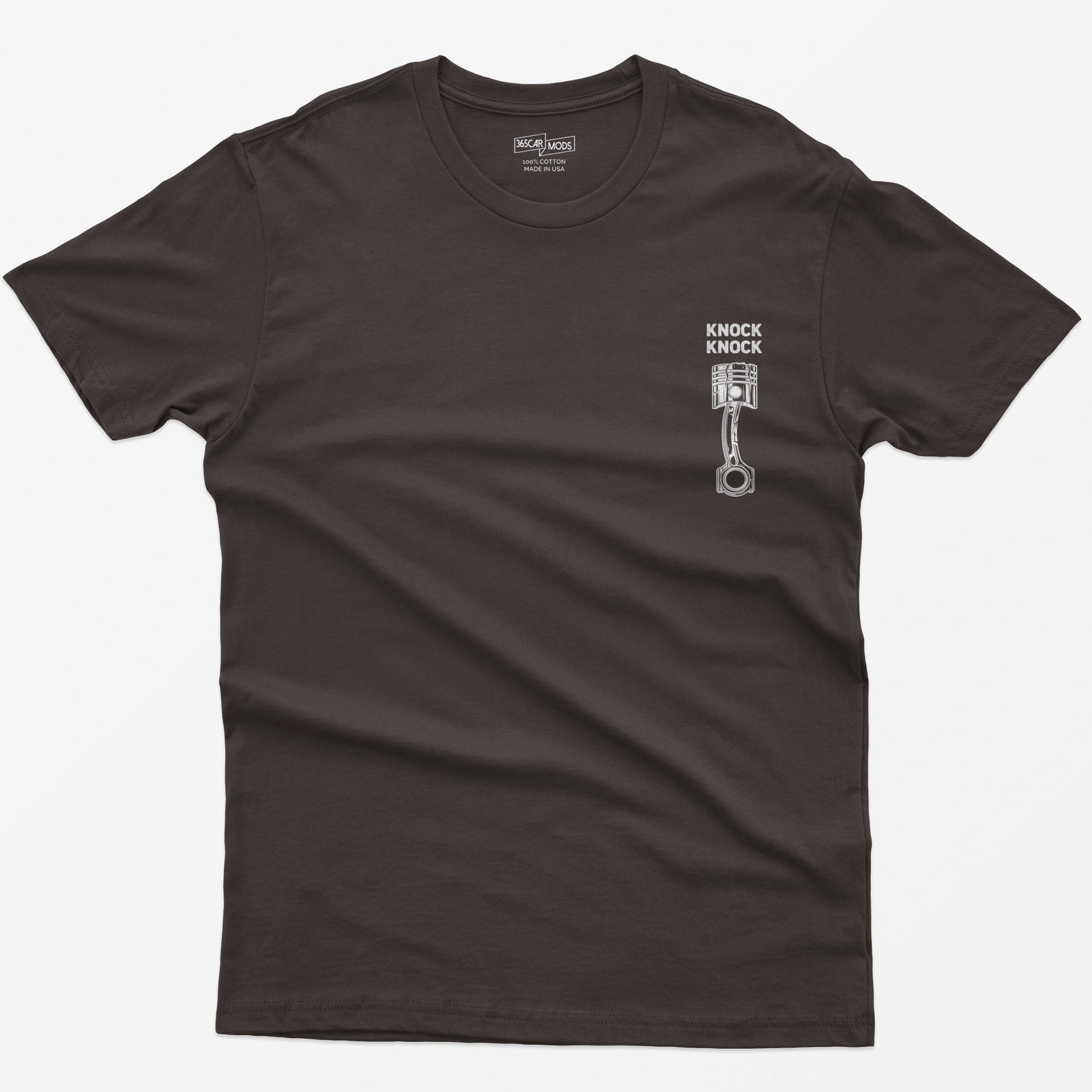 Dark Chocolate t-shirt with Knock Knock text above a white line-art piston and connecting rod with a damaged crown