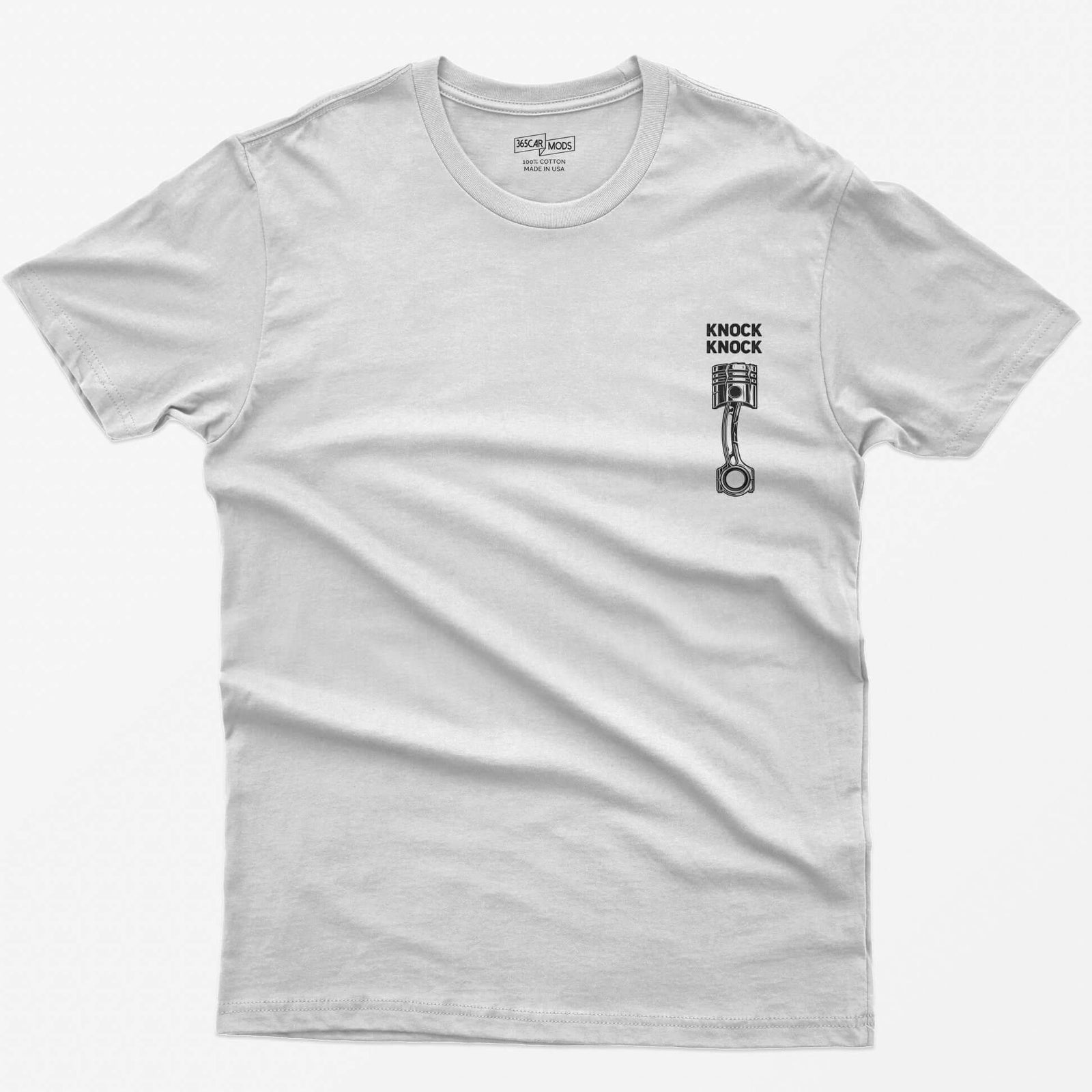 White t-shirt with Knock Knock text above a white line-art piston and connecting rod with a damaged crown
