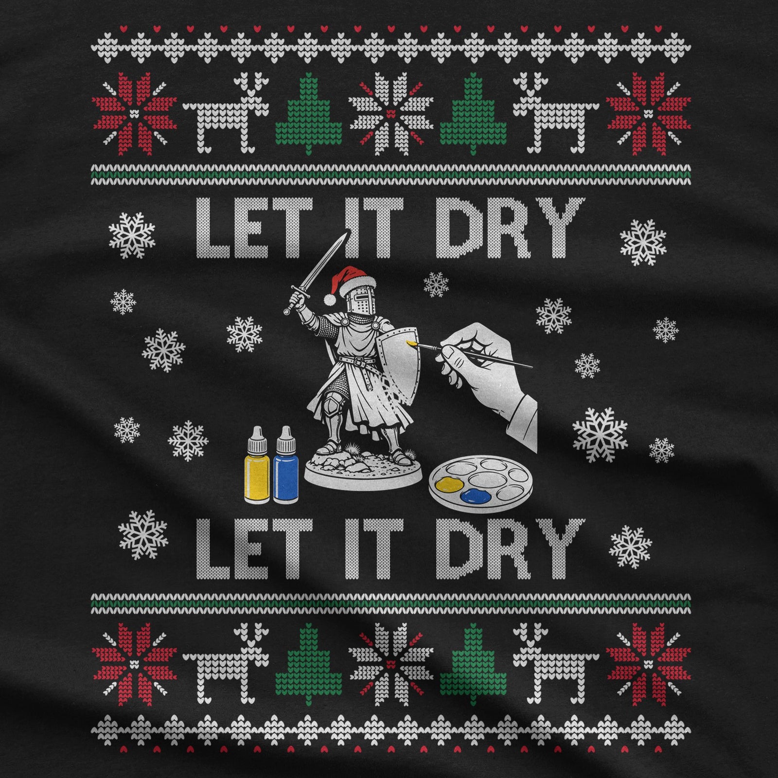 Close-up of the Let It Dry print: a knight miniature in a Santa hat, a brush hand, two paint pots and a palette between knit bands of reindeer and trees