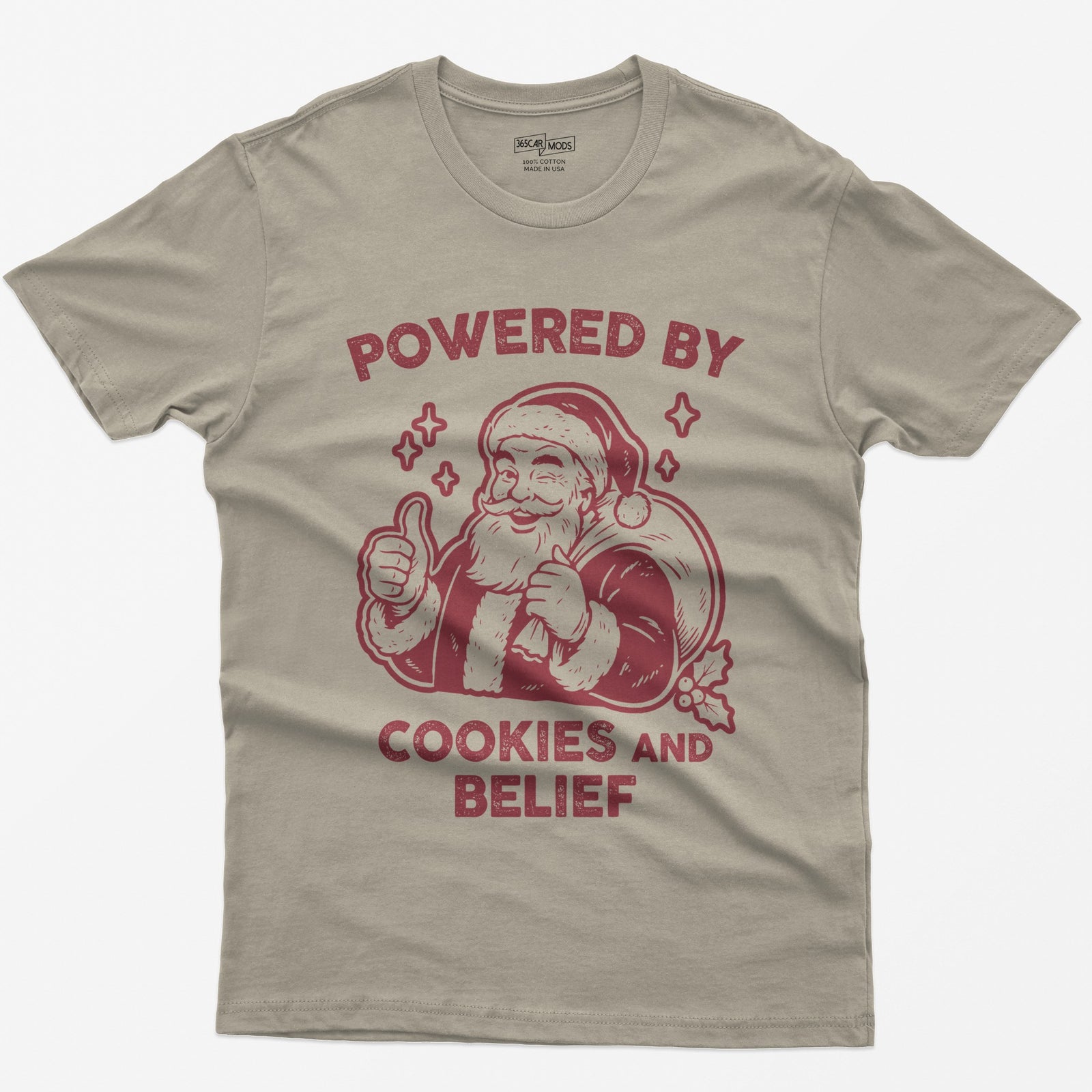 Sand t-shirt with vintage white print of a winking Santa giving a thumbs up and the words Powered by Cookies and Belief