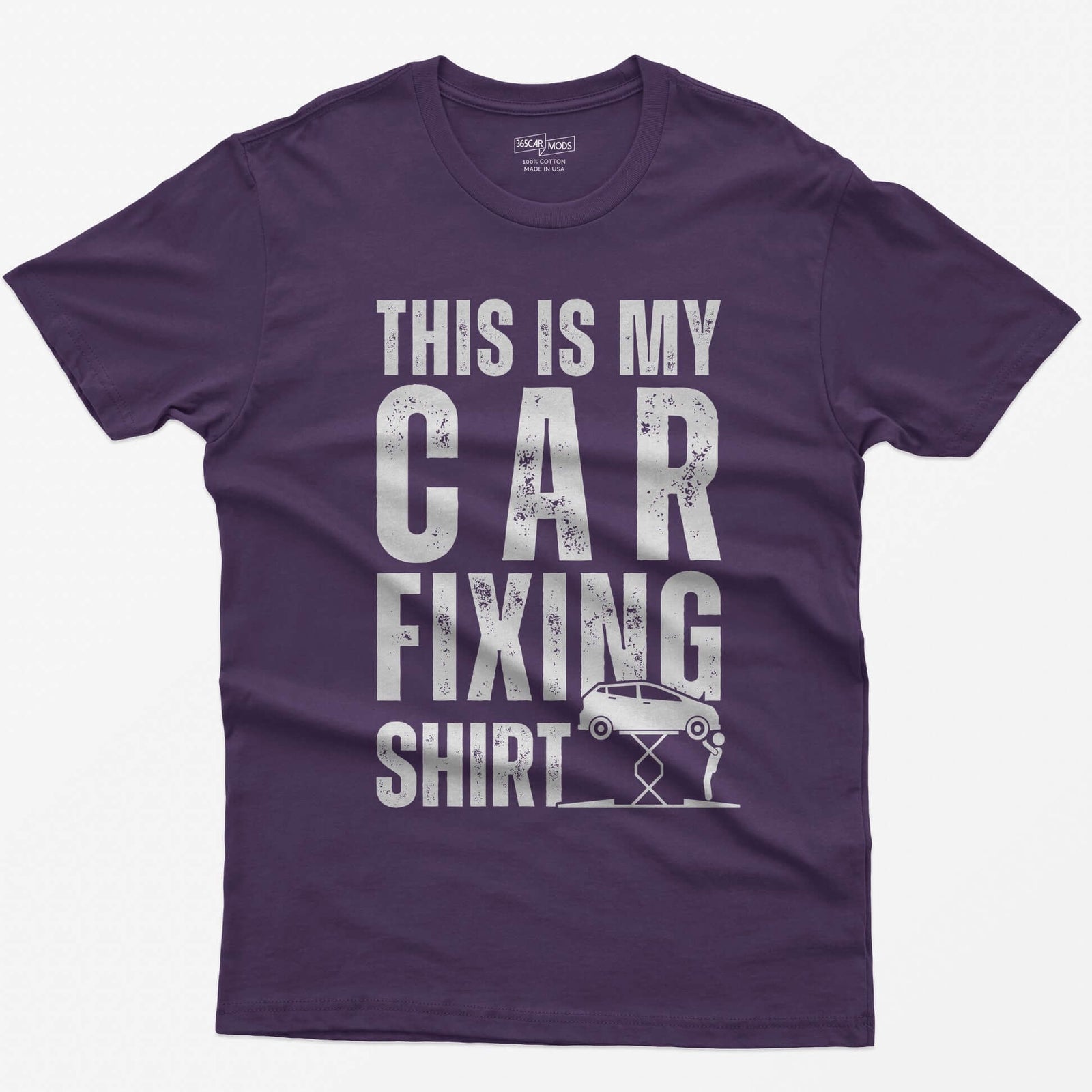 Purple t-shirt with This Is My Car Fixing Shirt in distressed white capitals and a small hatchback raised on a scissor jack