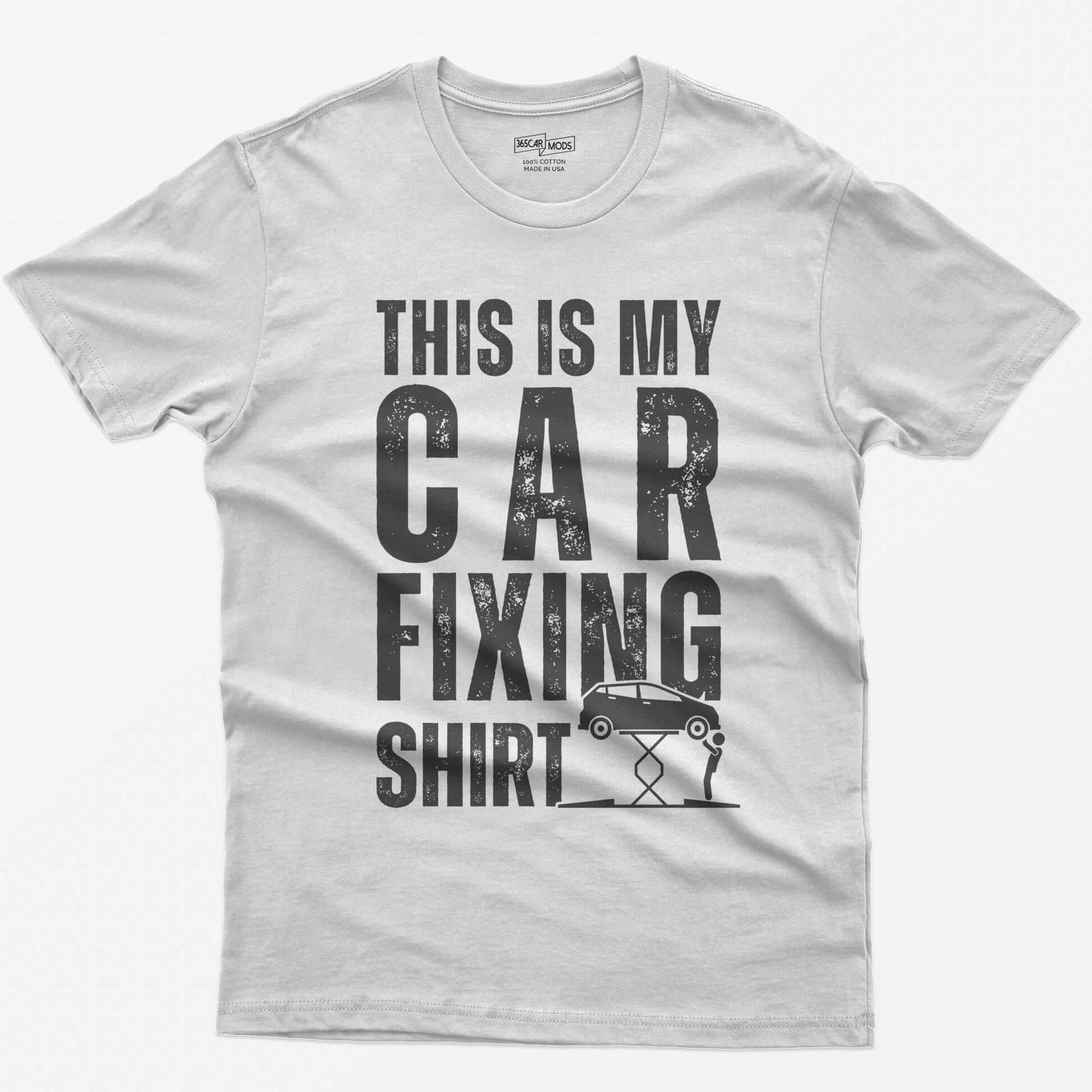 White t-shirt with This Is My Car Fixing Shirt in distressed white capitals and a small hatchback raised on a scissor jack