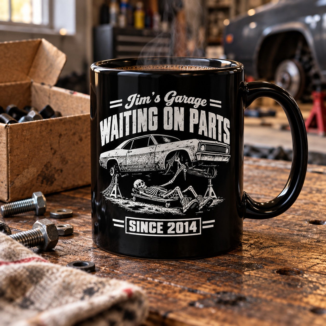 Waiting on Parts Personalized Garage Mug - 11oz black coffee mug on a garage workbench