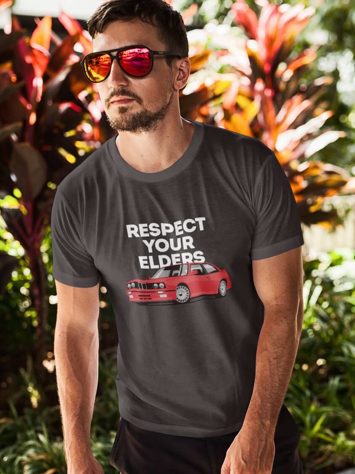 Legendary German car printed on dark grey car t-shirt designed for car lovers, car guys, car enthusiasts