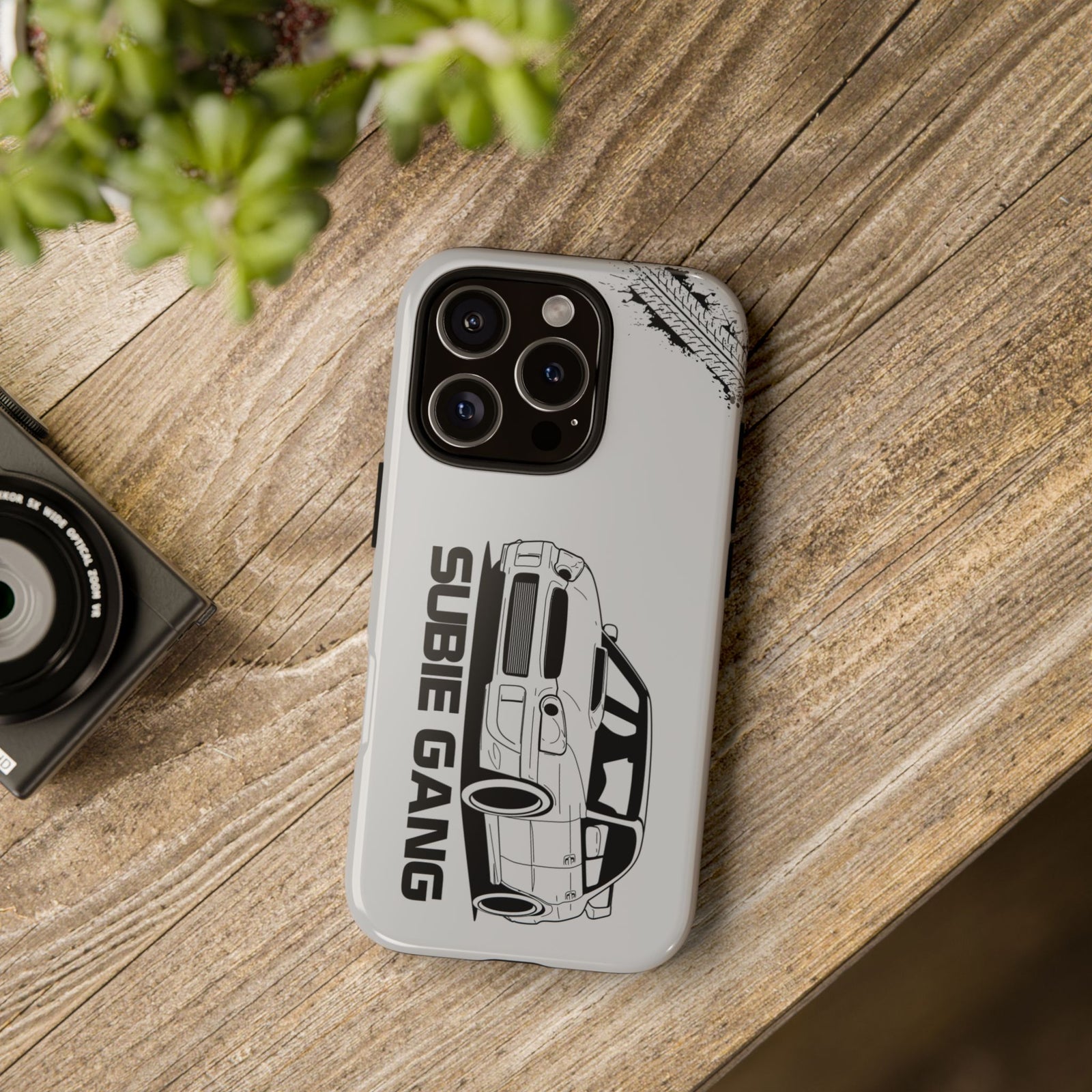 JDM Gang Tough Phone Case - iPhone 16 Pro, glossy, lifestyle photo