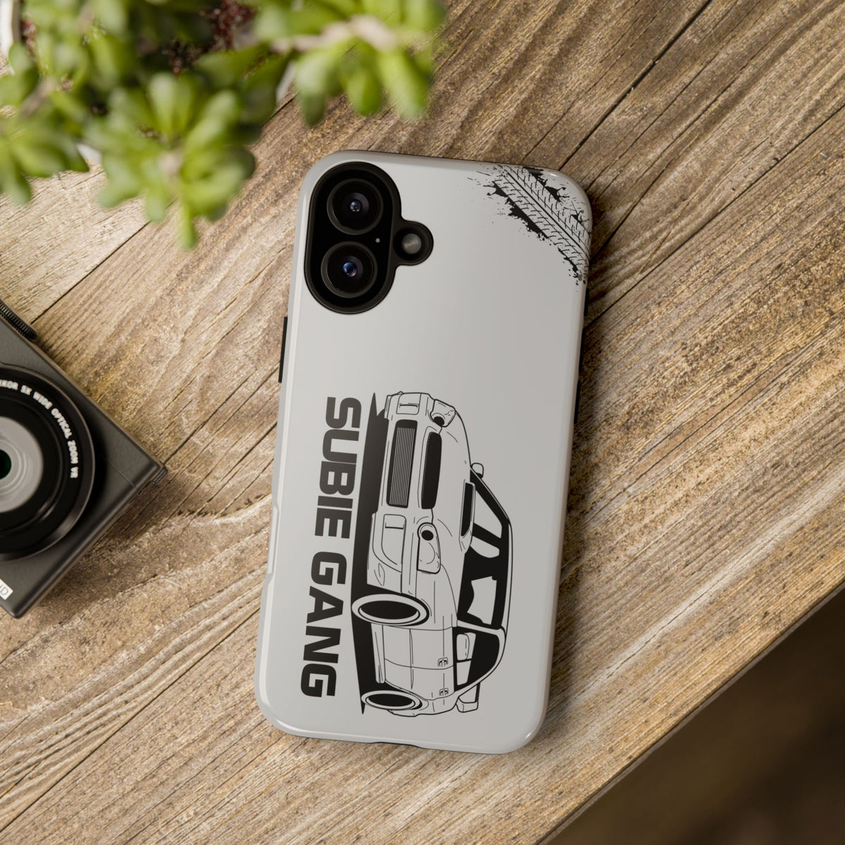 JDM Gang Tough Phone Case - iPhone 16 Plus, glossy, lifestyle photo