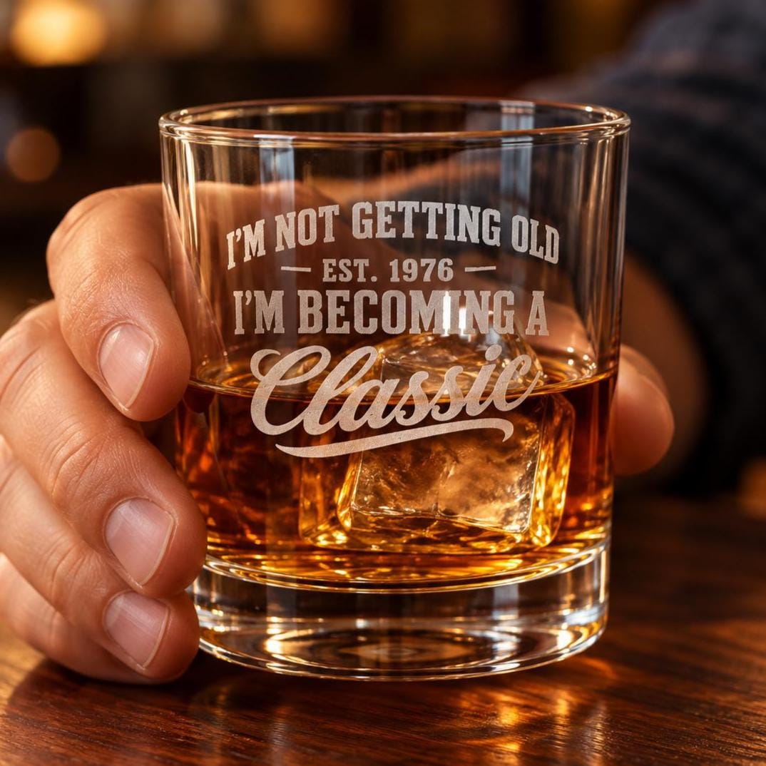 I'm Not Getting Old I'm Becoming a Classic Whiskey Glass - glass of whiskey held in hand at a bar