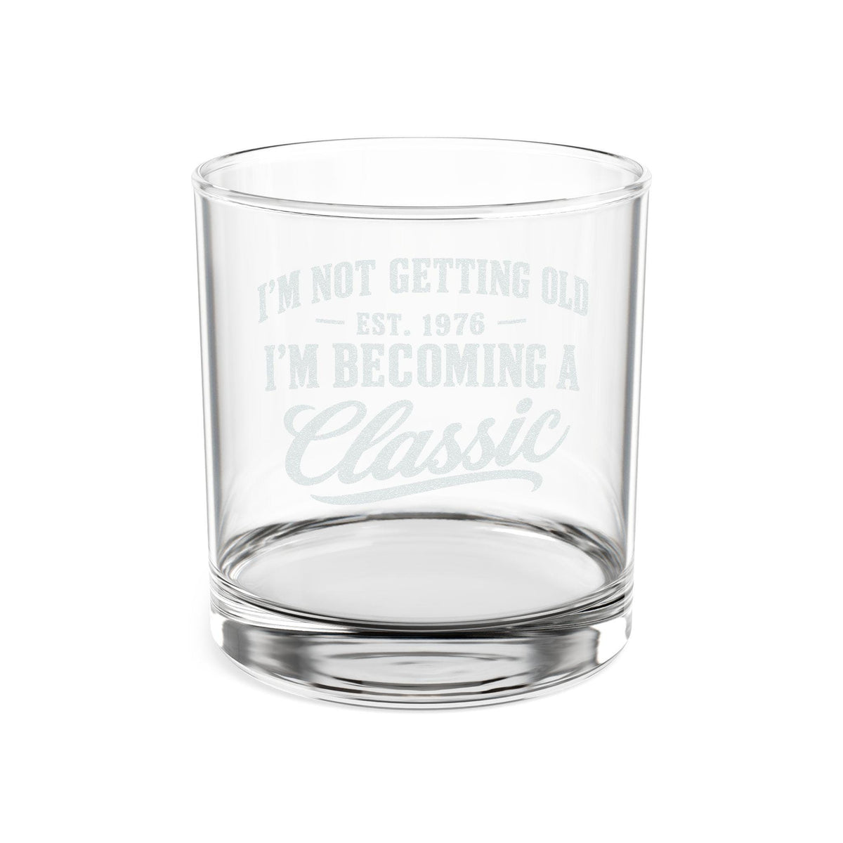 I'm Not Getting Old I'm Becoming a Classic Whiskey Glass - front view of the engraving with the year 1976