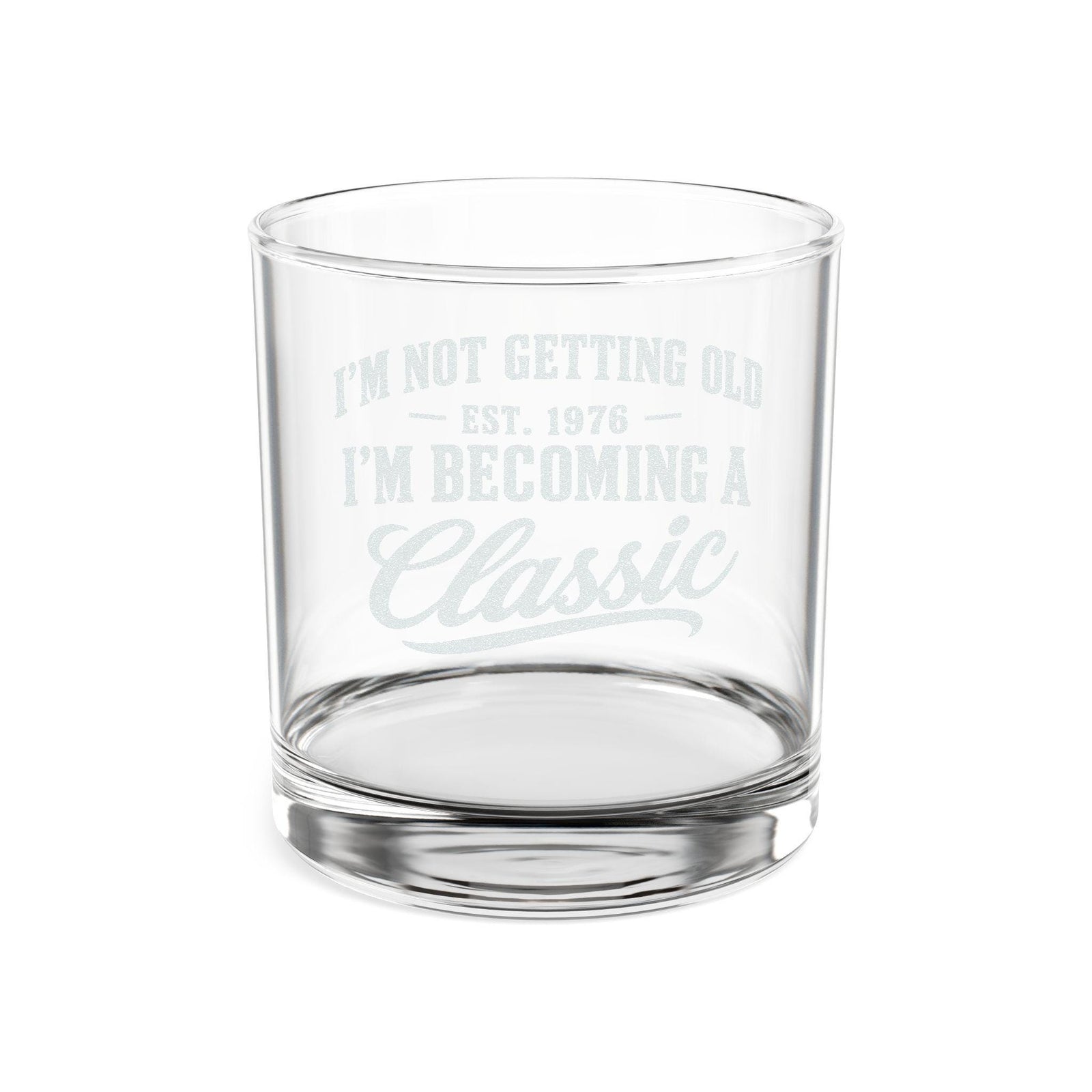I'm Not Getting Old I'm Becoming a Classic Whiskey Glass - front view of the engraving with the year 1976