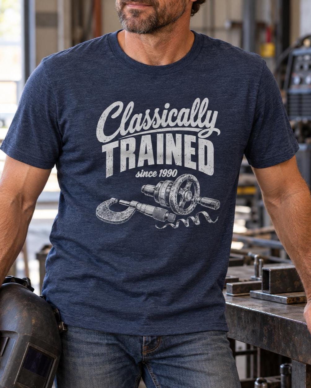 Machinist in the Heather Navy Classically Trained t-shirt at a workbench