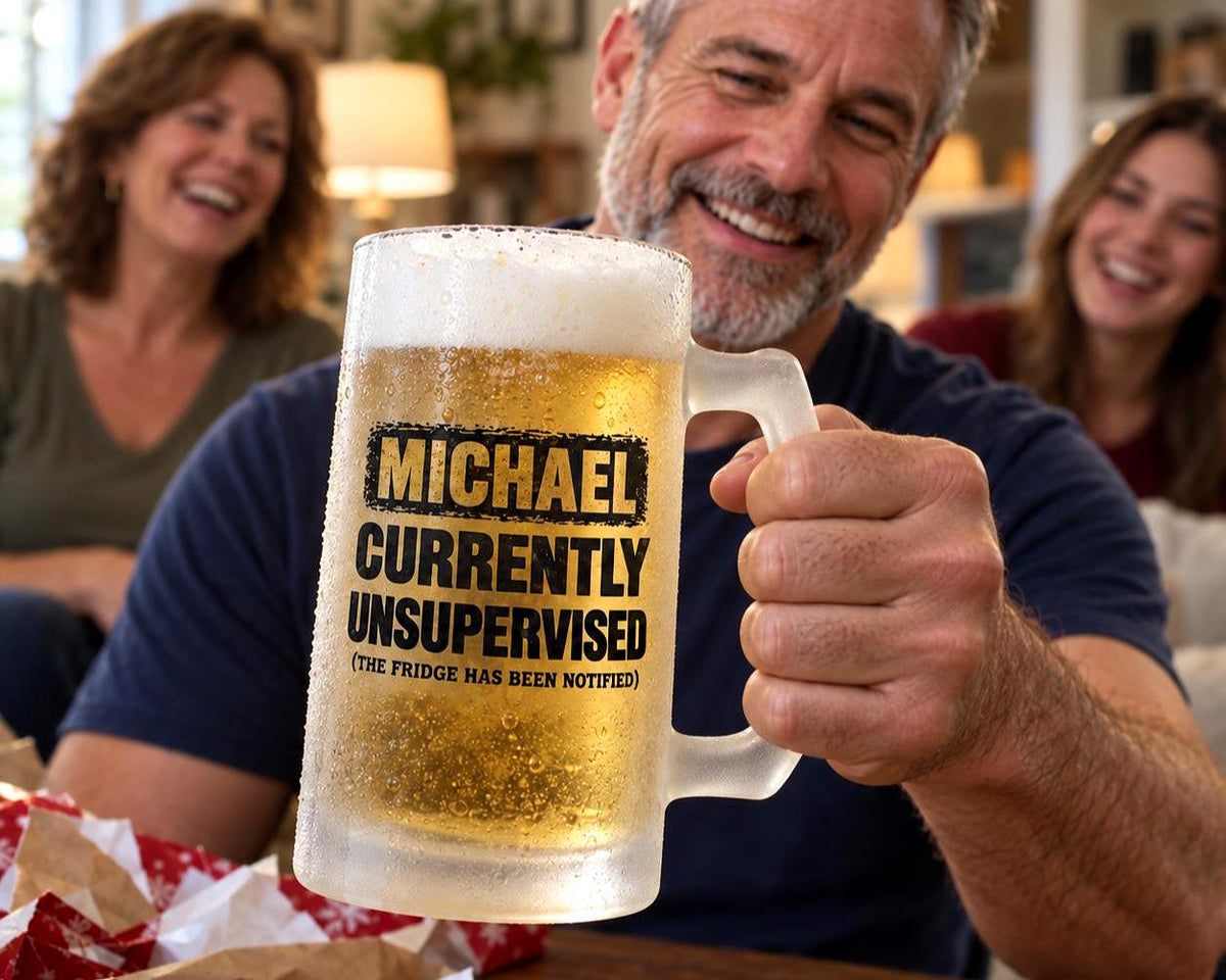 Currently Unsupervised Personalized Beer Mug - man holding up the mug with the name Michael while his family laughs