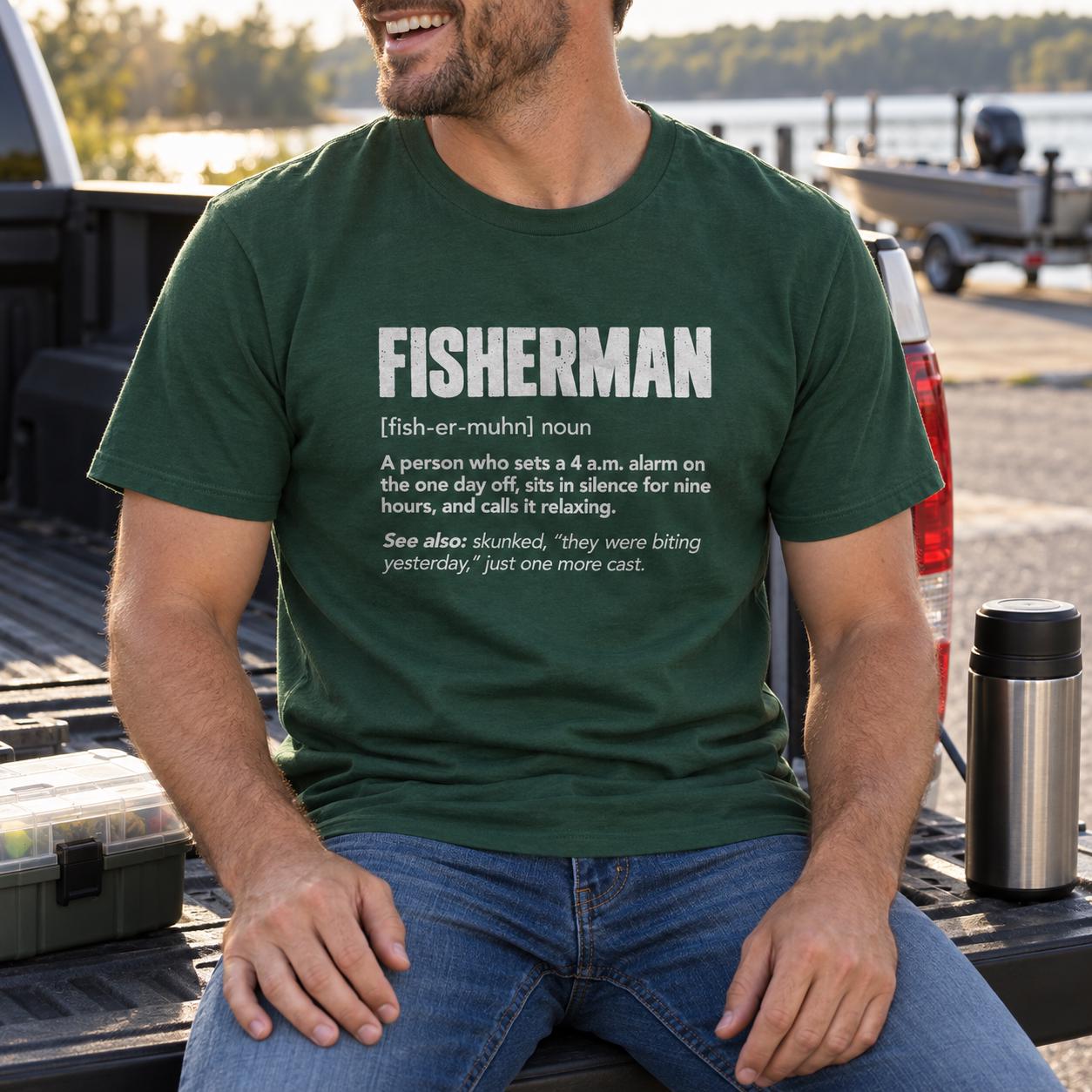 Fisherman Definition T-Shirt - man in the forest green t-shirt on a truck tailgate by the lake
