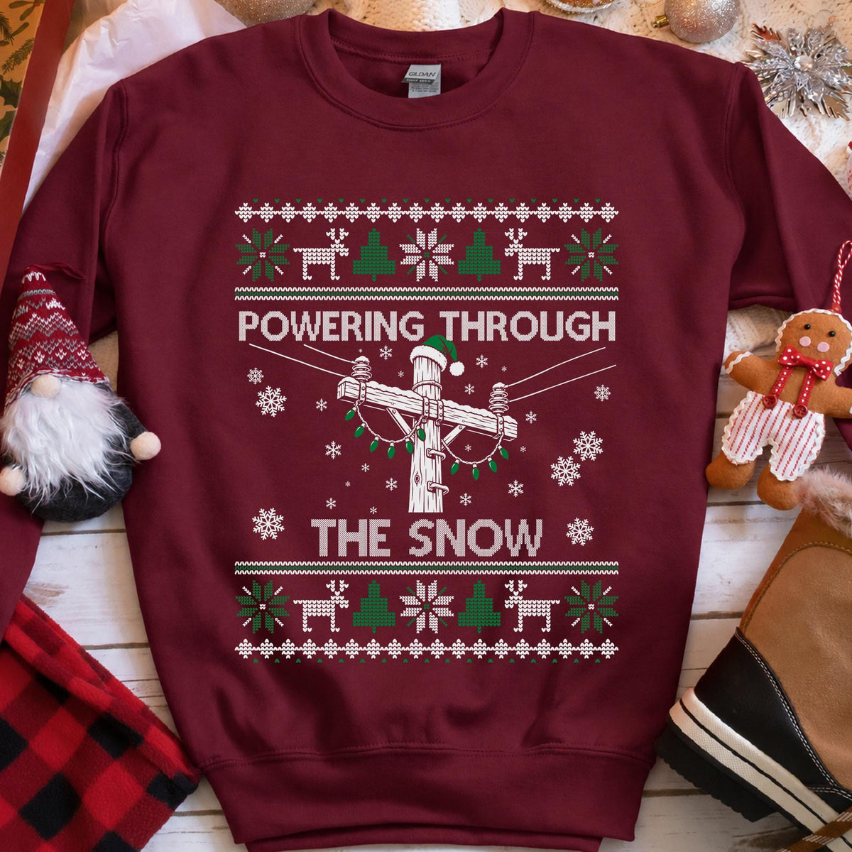 Powering Through the Snow Lineman Christmas Sweatshirt in Maroon