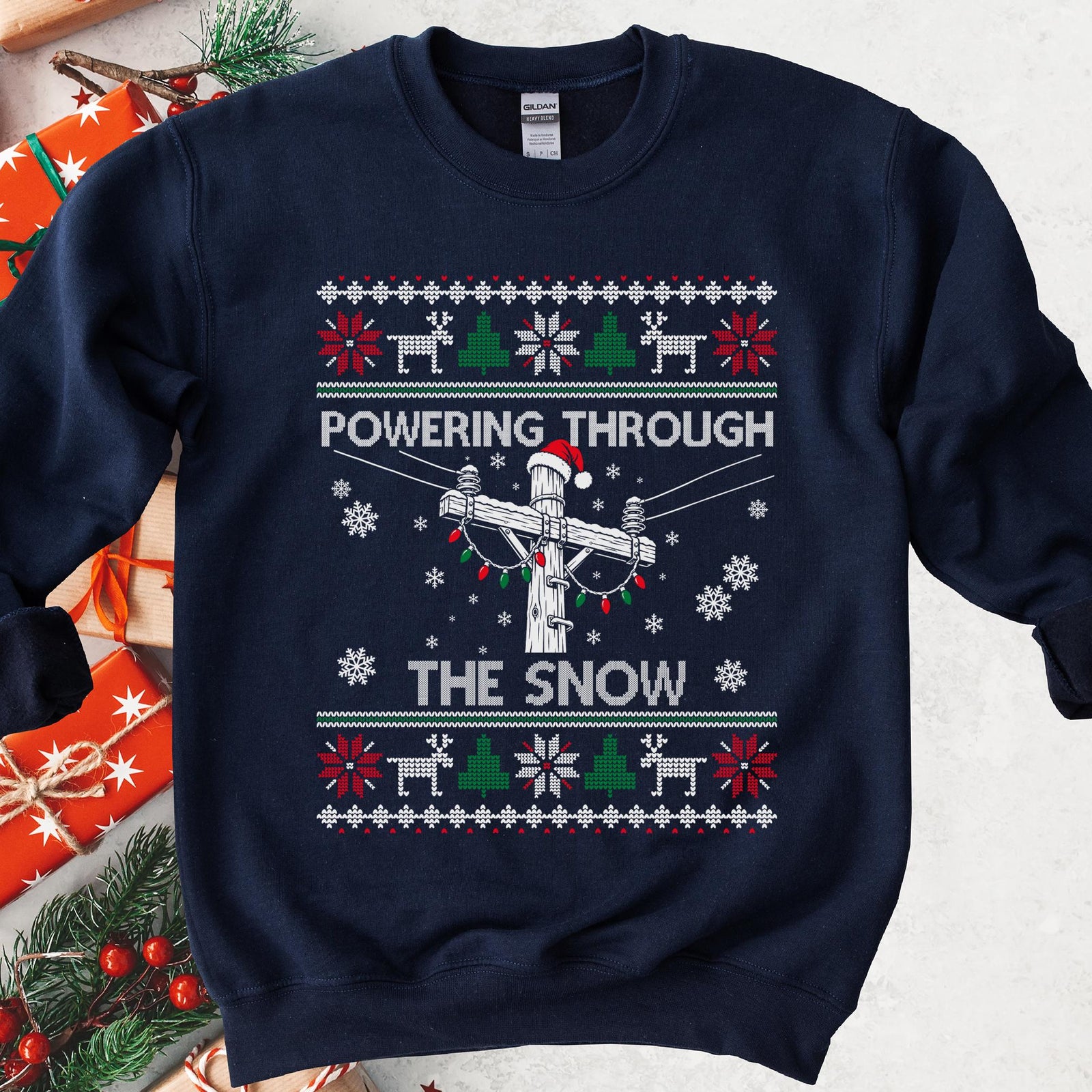 Powering Through the Snow Lineman Christmas Sweatshirt in Navy