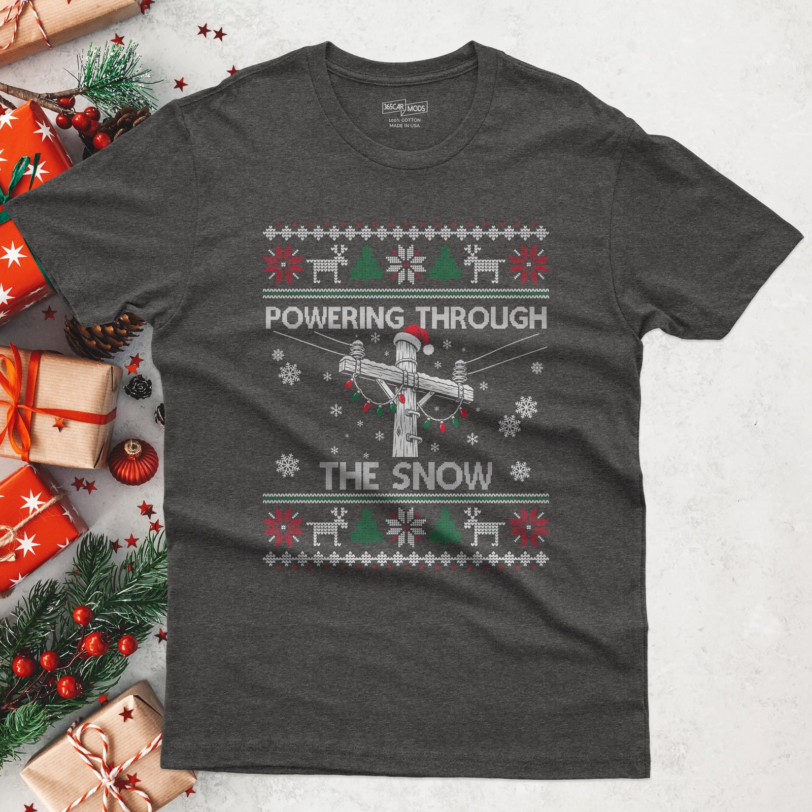 Powering Through the Snow Lineman Christmas T-Shirt in Dark Heather