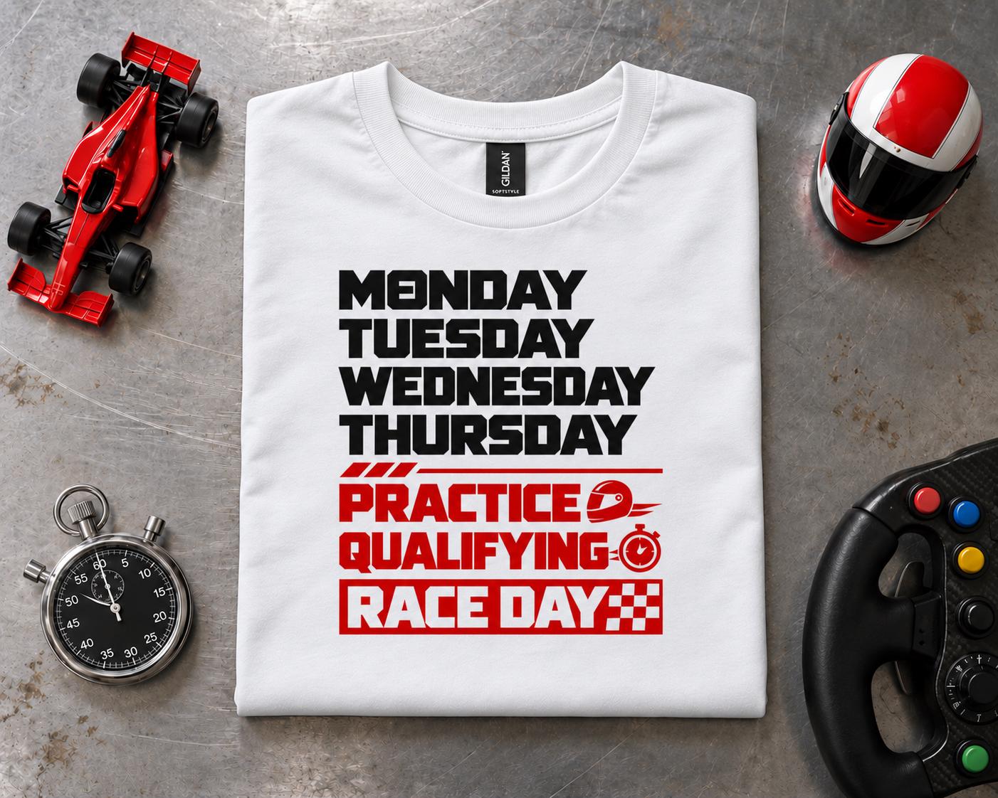 Race Weekend T-Shirt - white t-shirt folded next to a toy race car, a helmet, a stopwatch and a steering wheel