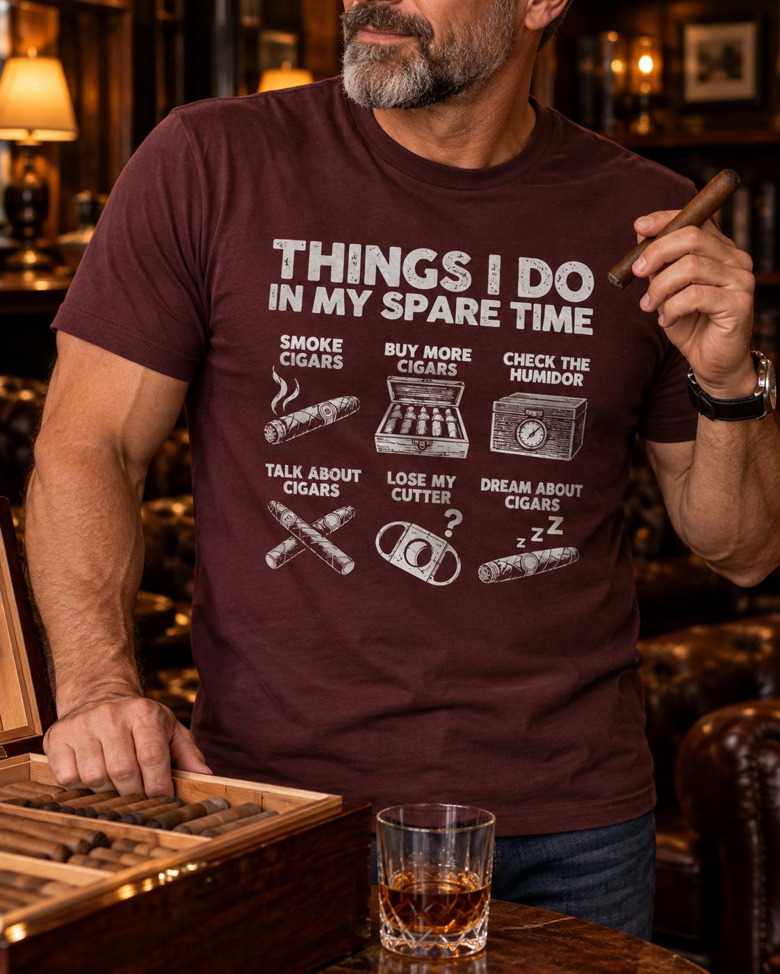 Things I Do In My Spare Time Cigar T-Shirt - man in the maroon t-shirt holding a cigar at a humidor